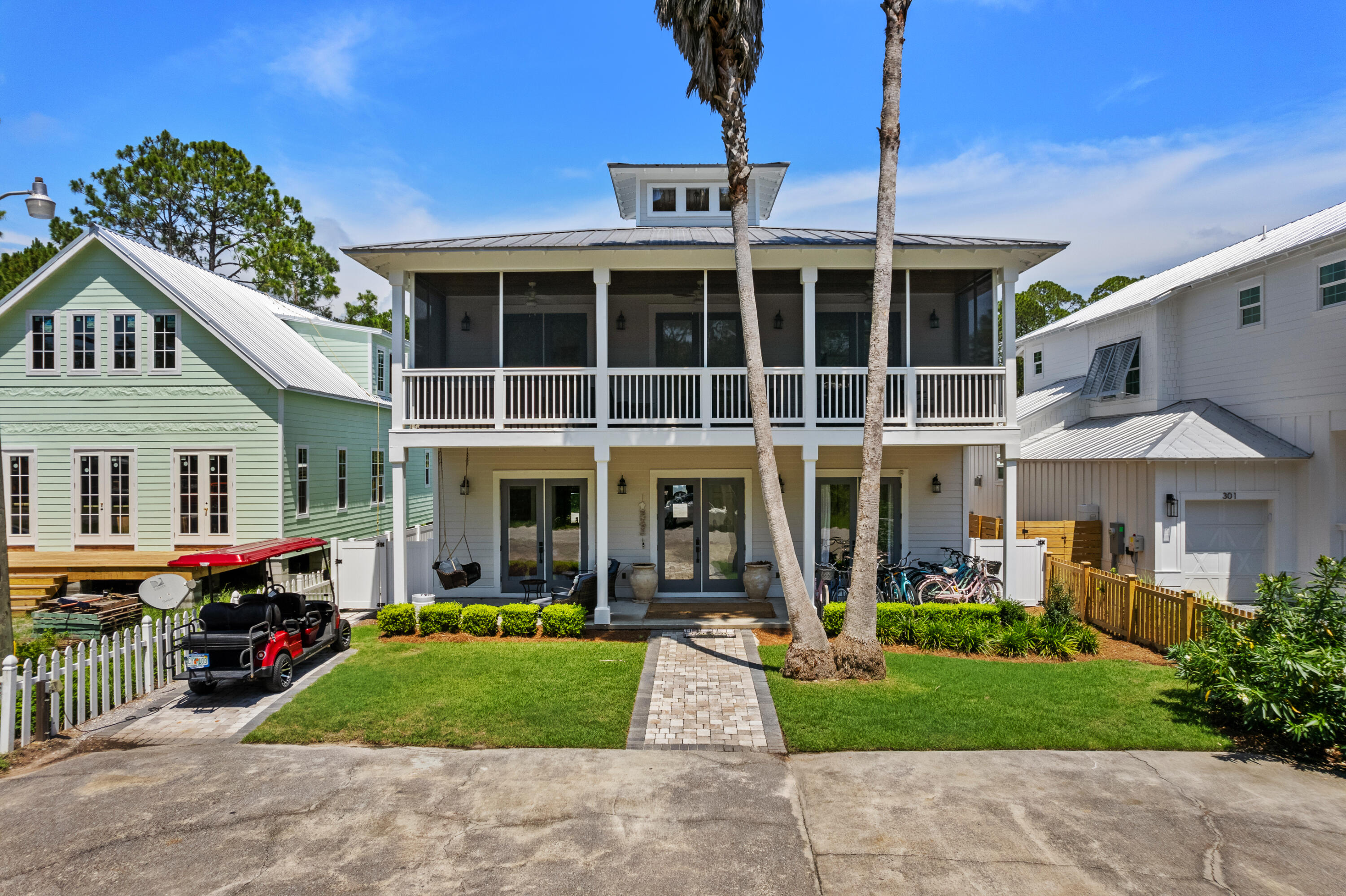 With guaranteed rental income and below-market financing, this property is undoubtedly one of the best investment opportunities along 30A. The projected income is $233k-$288k and the seller guarantees a minimum of $180,000 in rental income for 2025! Plus the seller is offering a special financing incentive at 5.5% APR on a 30-year fixed-rate mortgage for qualified buyers.  The home, outdoor amenities and furnishings are nearly all new or recently remodeled making this the ultimate turn-key luxury second home or short term rental investment.Prime Location with deeded beach access! Nestled in the coveted Gulf Shore Manor neighborhood of Seagrove in close proximity to Seaside, this property offers the largest expanse of both deeded and public beach access with parking along 30A. Guests will love the easy walking or biking distance to Seaside. With recent concerns about private beach restrictions, Gulf Shore Manor is protected by their court awarded deeded beach use rights. Another bonus is no HOA dues or HOA restrictions. The nearest beach access with parking, San Juan, is just four blocks away. Guests also enjoy the included golf cart and a dozen bikes for effortless transportation of beach gear.
Parking is often a challenge in vacation rentals, but this property accommodates five vehicles plus a golf cart, making it highly desirable! With a main house and a guest house, both featuring full kitchens and living areas, this home is perfect for multiple families vacationing together, family reunions, corporate retreats, and groups of friends.  And with a sleeping capacity of 21+ people it commands a premium nightly rate.
Outdoor amenities: The private heated pool, spa, gas grill, private dining patio, and fully screened upper porch are popular outdoor amenities. 

Recently remodeled: The entire guest house, landscaping, pool, and master bathroom have all been expertly installed or remodeled by the current owners within the last few years with the balance of the main house remodeled recently as well.  The entire exterior was just painted so the new owners can immediately enjoy making memories in this amazing beach home while your short term renters pay the bill.
Elegant Design and Layout: The main house boasts a gorgeous kitchen with timeless bespoke shaker style cabinetry, dining area, great room, screened porch, and master bath on the upper level. The great room features vaulted ceilings with tongue-and-groove details. The master bathroom was remodeled in spring 2024 with a luxury carrara marble shower as the centerpiece. The main floor includes two private bedrooms with ensuite baths, a large bunk room with two sets of queen-over-queen bunks and trundle (sleeping 10), another hallway bathroom, and a kids' game room with video games, a sofa, TV, and built-in twin bunks.
The guest house features another living area, full kitchen, mini bunk with twin over twin bunks, a full bathroom, queen bedroom, and a master suite with full bathroom.  The guest room was completely remodeled top to bottom in 2021.  Be sure and view the Matterport virtual tour and floorplans.

This stunning, fully furnished property includes a professionally designed website at elmbythesea.com for direct bookings, in addition to listings on Airbnb, VRBO, and more. High cash flow and beautiful included furnishings make it an irresistible investment.
Don't miss this unparalleled coastal paradise! Embrace the essence of luxury, convenience, and extraordinary investment potential in your own dream oasis. Act now and secure your place in one of 30A's most desired communities. Seller is flexible on closing dates...a delayed closing to coincide with a future 1031 sale is fine
