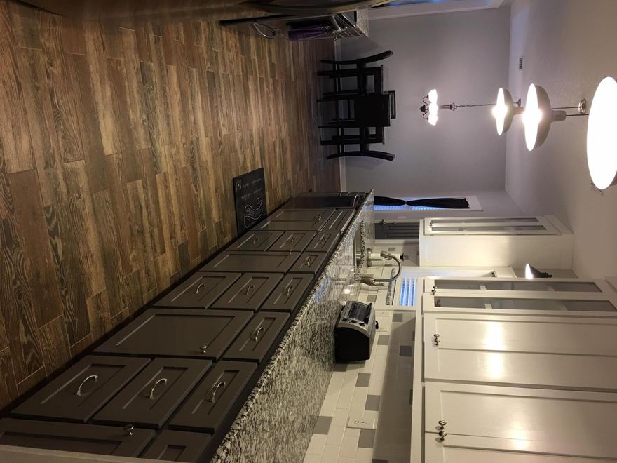 Beautiful almost New home in Freeport. New Construction in late 2014. Large oversized nearly 1/2 acre lot. Oversized covered carport with oversized mudroom. Gorgeous modern kitchen with granite, faux wood look tile floors, and stainless steel appliances. Tile throughout entire home. This home has many upgraded features including full tile stand up shower in maser and high end finishes. Huge backyard with mature tree surroundings. Home is on a paved street with city water and sewer. High efficiency Rheem central air and heat.