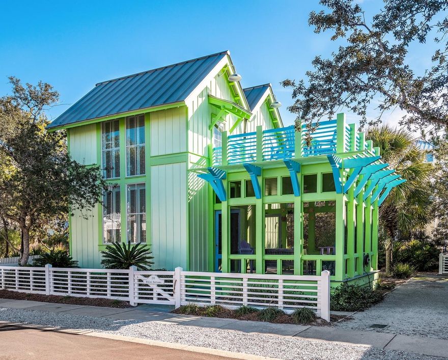 WELCOME HOME to your DREAM Beach House. BIKINI BOTTOMS is the most magical, fun, whimsical beach cottage on the Emerald Coast. Designed by famed Dungan/Nequette Architects, featured in Southern Living, this colorful dream cottage, just steps to the sugar white sands and emerald Gulf waters, features 2 bedrooms with en suite baths on the 1st floor, charming and inviting outdoor living with a screened porch, upper deck for enjoying sunsets and sunrises. 2nd floor is made for happy times with living, dining and kitchen artfully planned with the most magical display of color and light. Large lot waiting for your main home with Dungan/Nequette rendering. Carillon Beach is a gated Gulf front community with 3 pools, playgrounds, tennis courts, lake, promenades and a Gulf front beach club.