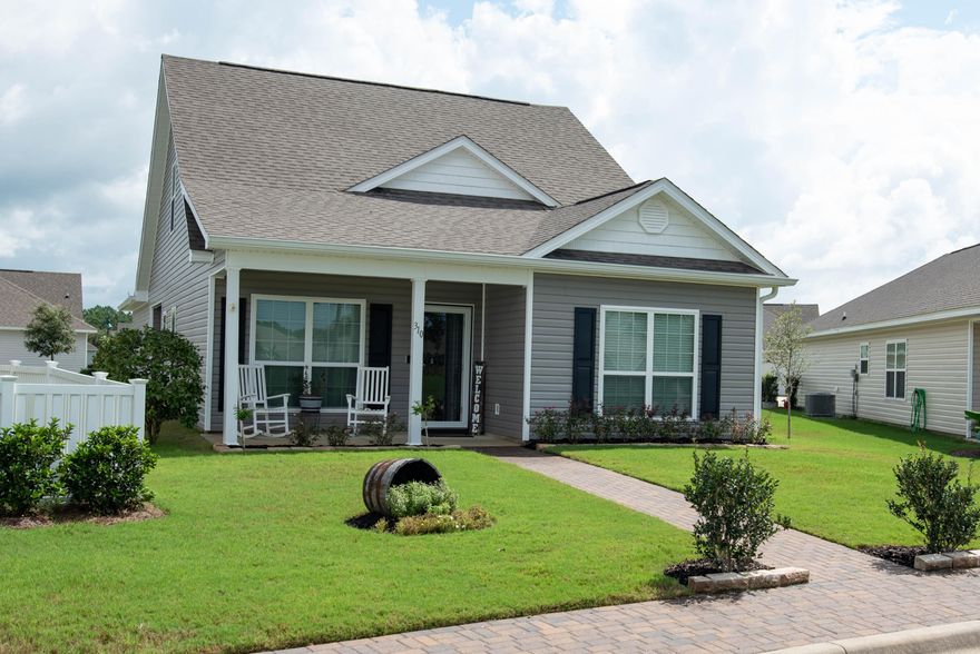 You'll love this large lot overlooking an open park area. Enjoy watching the kids play and colorful sunsets from your own front porch. This DR Horton Cary plan has 4 bedrooms, 3 full baths, 2 car garage, covered porch & covered patio. Master bedroom and one additional bedroom are on the first floor.  Open living concept. Spacious kitchen with ample cabinets, kitchen island, pantry, and stainless steel appliances.  HOA fees include access to  pools, 24hr gym, Clubhouse, Movie Theatre, Tennis, Pickleball, and Basketball Courts, Playground, Bay Club with Fishing Pier. HOA in Schooner Landing also INCLUDES cable and lawn care.