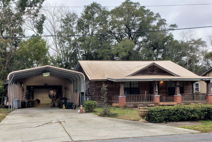 Great starter home! It's affordable and convenient, less than 5 mins to Wal-Mart, walk to the beautiful Lake Defuniak and Walton Middle School. This vintage, 3 bedroom, 2 1/2 bathroom home has 5 yr old HVAC and hot water heater, 8 yr old metal roof, and copper wiring. A large, beautiful screened in back patio for watching the birds in the fenced back yard, and a southern style front porch for rocking chairs provide a peaceful country feel. There is a generous living and dining room upfront and an additional family room off the kitchen and master bedroom. HUGE detached garage with a carport. Kitchen, baths and flooring could use updating and home is priced accordingly. Sizes are approximate and buyers should verify all dimensions important to them.