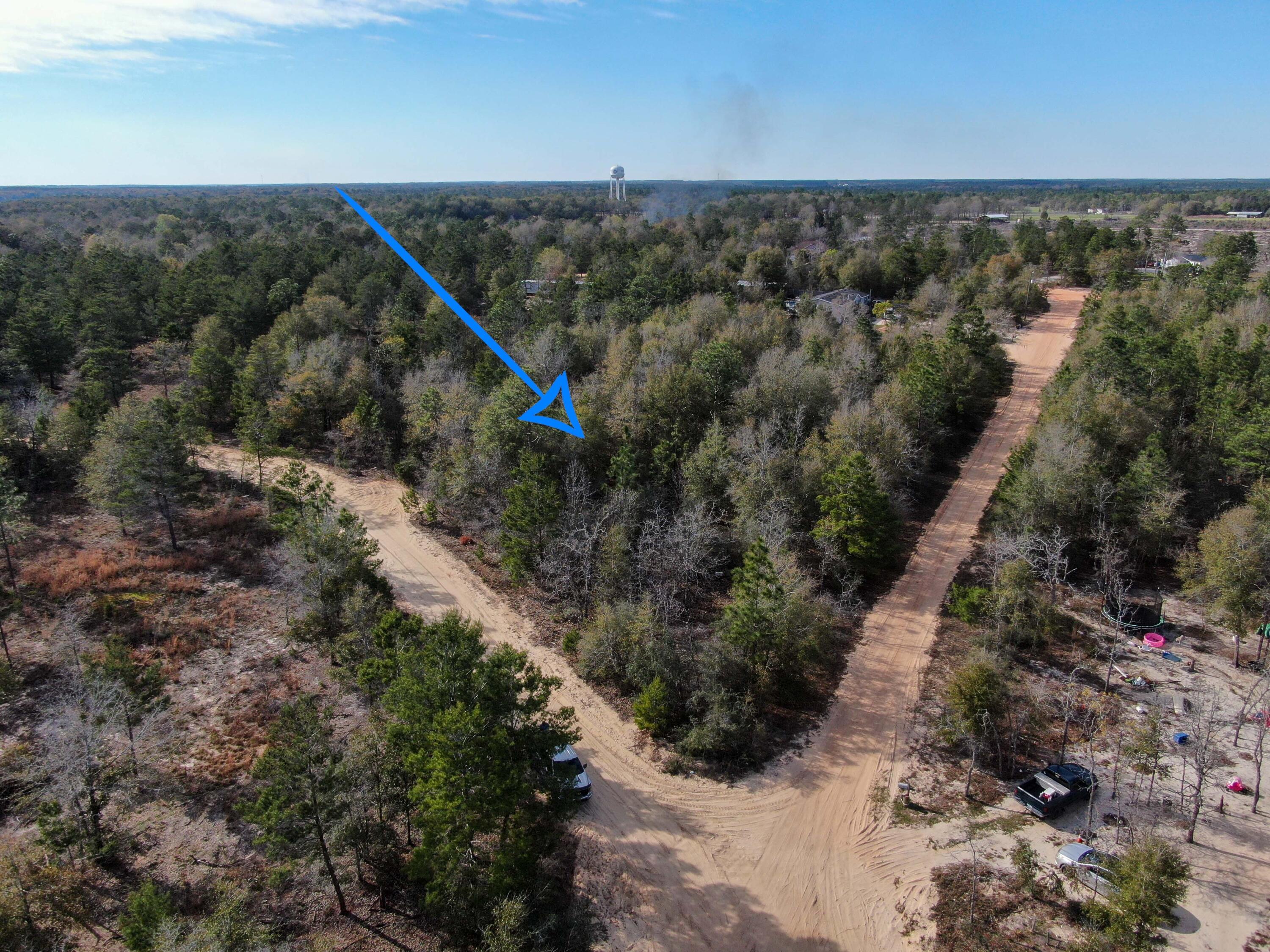 Over an acre of high and dry land ready for your new home! Located in the popular Juniper Lake area, this corner lot is the perfect place to build your dreams. Bring your building plans or set up your new manufactured home on this spacious parcel.