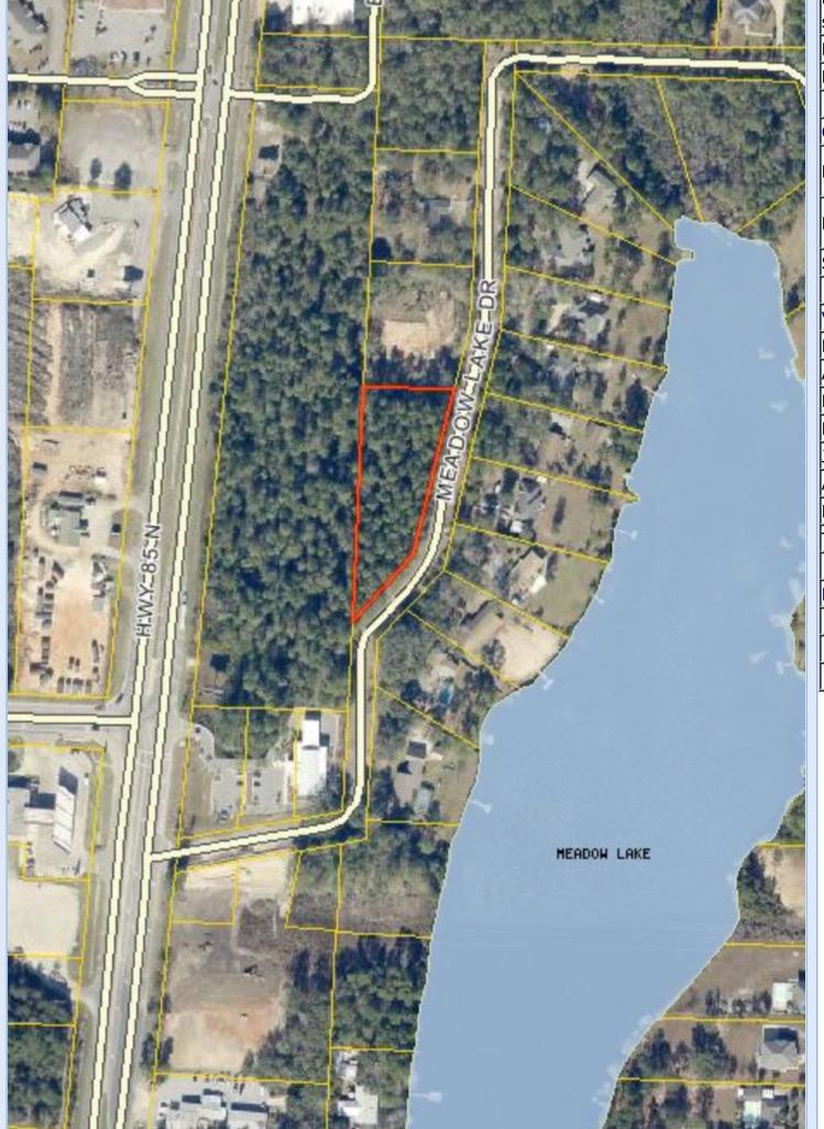 Attention builders, 3 LARGE Lots, or one HUGE parcel, endless possibilities. SOUTH CRESTVIEW location, 1.27 acre wooded building lot in a quaint setting on Meadow Lake Drive across the street from the lake! It's becoming unheard of to find la lot this large on the South Side of Crestview. Buy now and build your dream home, or hold for the future as there are no build out time requirements! Seller has survey showing this parcel divided into 3 separate lots. If you don't need a parcel quite this large you could build on part and sell the rest. Low county taxes, the quickest commute to area military bases, this is a Unique opportunity and the property is priced to sell!
