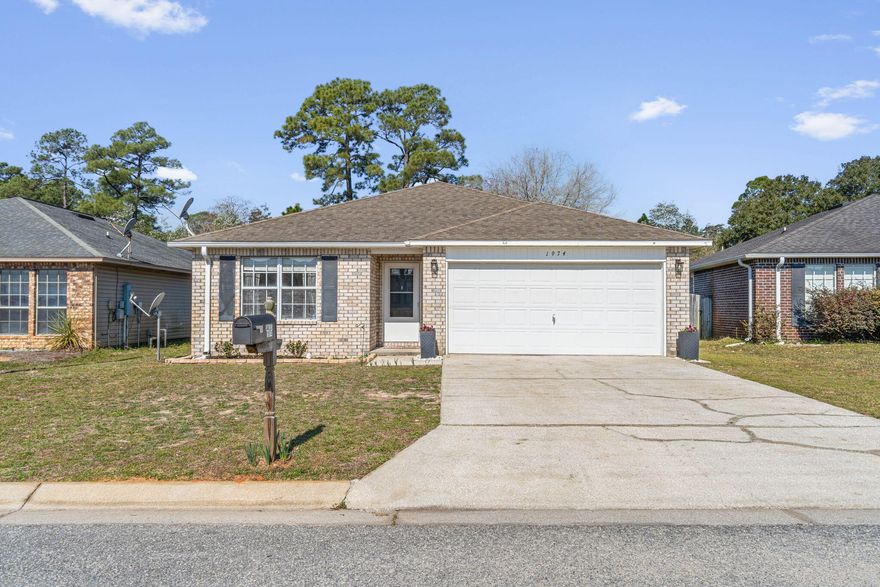 Location, location, location! This beautiful 3-bed, 2-bath home offers an open floor plan with a huge living room, perfect for entertaining. The kitchen features an island, stainless appliances, and a walk-in pantry. The spacious master has a double vanity and big walk-in closet. Enjoy outdoor living on the covered patio overlooking the fenced backyard & large wooded area offer a natural view. Tucked in a quaint community with underground utilities, no HOA, and just minutes from shopping, dining, and sugar-white beaches! Plus, with an acceptable offer, the seller will replace the roof before closing. This home also qualifies for a VA Assumption at 2.75%. You must qualify for the VA Loan using your own entitlement. Contact your agent for more details!  You don't want to miss this one!