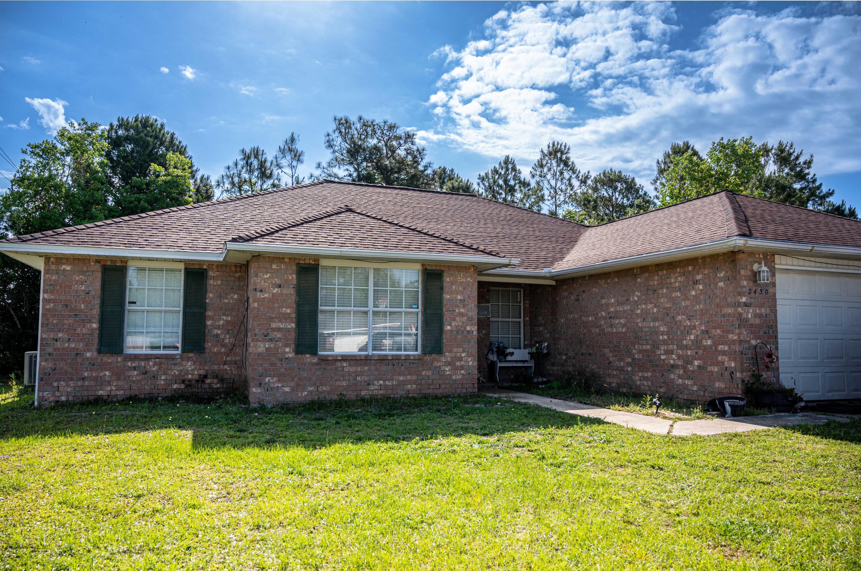 Located in the heart of Navarre and walking distance to Navarre High School, this large 4 bedroom 2 bath home is ready for new owners. Built in 1999, this split bedroom design home has new newer flooring, granite in the kitchen, some appliances and a large yard! Be minutes from Navarre Beach, the bay, or on your way to interstate access north of HWY 87. This home is ready for new owners and a special touch.