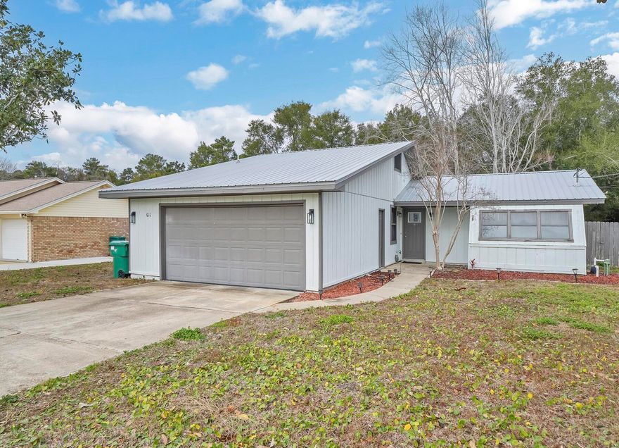 Welcome to your charming Retro haven in the heart of West Destin! This 2-bedroom, 2-bathroom gem is a delightful blend of modern upgrades and timeless style. A new metal roof ensures durability and contemporary flair.LVP flooring throughout adds a touch of style with easy maintenance.The kitchen is a chef's dream with stainless steel appliances, granite countertops, and a modern backsplash. Ascend the spiral staircase to a spacious bonus room upstairs, offering endless possibilities - an extra bedroom, office, playroom, or media room. Step into your private oasis with a fenced yard offering ample space for a pool and a charming outdoor kitchen.Green thumbs will appreciate the attached green room - perfect for gardening or versatile storage.