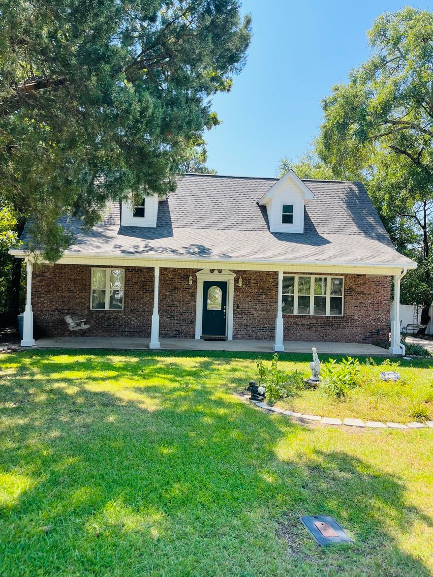 Brand NEW ROOF on house & garage!  NO insurance worries here.  This traditional brick beauty is packed with features and a great location!  Only 1 mile to Florida Park and Boat Ramp, 2 miles to Eglin AFB and 2 miles to Turkey Creek, there's also 2 neighborhood parks around the block!  This property sits on a .25 acre lot with vinyl fencing and a large (24x34) combination garage/workshop.  Step inside this thoughtfully designed home and you'll notice tile floors, high ceilings, gas fireplace, an office space, guest bath and laundry room.  The spacious kitchen and dining area has a handy pantry, breakfast bar and shaker style cabinets.  The downstairs main bedroom has a sitting room, double vanities and garden tub.  This property includes an energy efficient geothermal HVAC too.