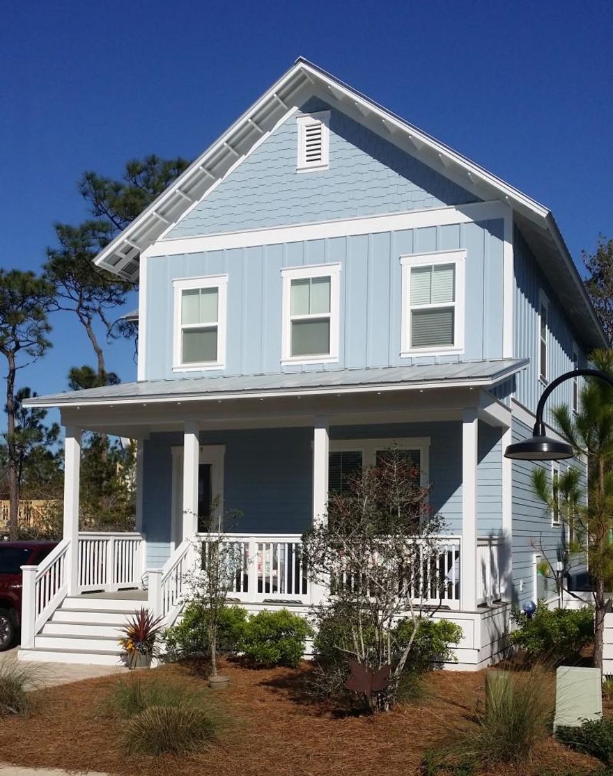 Florida Cottage Style Home nestled in the nearly sold out Highland Parks Community in the center of scenic route 30A in Blue Mountain Beach. Situated on the lighted trail leading to the the pool and connecting to the Point Washington State Forest, this Emerald Homes built house features 10 foot ceilings downstairs and 9 foot upstairs. Open floor plan leaves lots of room for entertaining and family living. Extra large storage room, outdoor enclosed shower, screened rear porch, extra paved parking are just a few of the upgrades in this home.