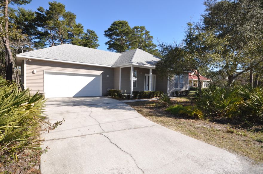 Great location! Just north of 30A and the Beautiful Beaches of South Walton. Close to Goatfeathers, Local Catch and Cafe Tango and the beach access at Gulfview Heights. This 3 bedroom and 2 bath home offers an open floor plan with a two car garage. Privacy fence along the back of the property. Wonderful covered screened porch off the back of the home provides a really nice area.