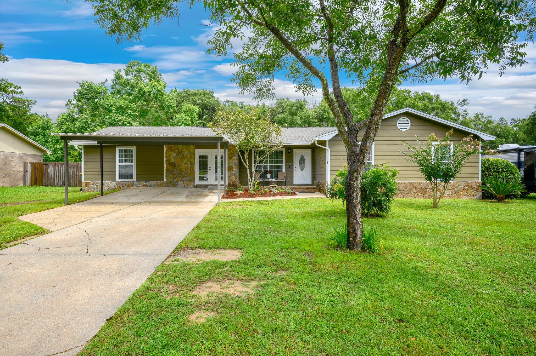 BRAND NEW ROOF!!! 'Sellers to assist with buyer's closing costs w/ acceptable offer!' Beautiful 4 BD/3 BA pool home situated on a 1/2 acre lot in a close to town location. The home features a semi open floor plan w/ kitchen boasting beautifully stained cabinets, stainless appliances and quartz countertops. A moveable island 2/ bar seating will stay as well. Nice sized dining room w/ wood burning fireplace and spacious living room. The home boasts two master suites - one very large w/ nicely updated bathroom w/ large tiled shower and walk-in closet. All bedrooms are a nice size. The large patio leads to an in-ground gunite pool w/ hot tub area. Summers will be better relaxing and cooling off in your sparkling swimming pool. Backyard is fully fenced w/ outbuilding for storage.