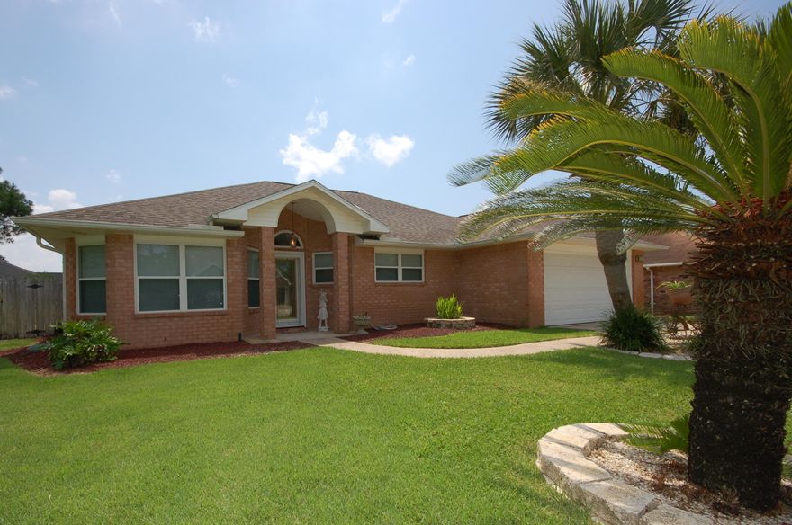 Gorgeous Navarre home with tons of custom upgrades! This is a MUST SEE home and won't last long. Gourmet kitchen includes beautiful custom tile counter tops, a perfect sized matching island that includes drawers and cabinets for extra storage, awesome matching stainless steel appliances, and even a copper sink! Home has designer paint, flooring, and trim throughout, and a huge master bedroom and bath includes wonderful whirlpool garden tub for relaxing and a separate shower. Home has a heated and cooled Florida room that steps out into your own private oasis that includes enclosed swimming pool with tons of room for entertaining and adding hammocks, outdoor kitchen, ping pong tables, or anything else you desire!