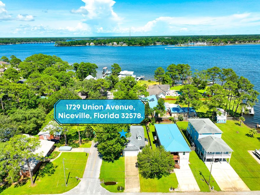 **Roof 2019-Water Heater 2006-HVAC 2007** A marvelous Home on a corner lot close to Bayshore Drive and within 1/2 mile to the water. With a peek-a-boo view of the Bay from a window or two, this home is sure to impress. Boasting 3BR/2BA, and over 1,700 sf of living space, you surely don't want the opportunity to pass you by. The first floor is open and airy and has a great sized kitchen with all stainless appliances. On the second level are two additional bedrooms that share a full sized bathroom. There is deep luxurious vinyl plank flooring throughout the home with carpet in the bedrooms. You owe it to yourself to have a look and see if this one can become yours. Don't think twice and schedule your appointment today!