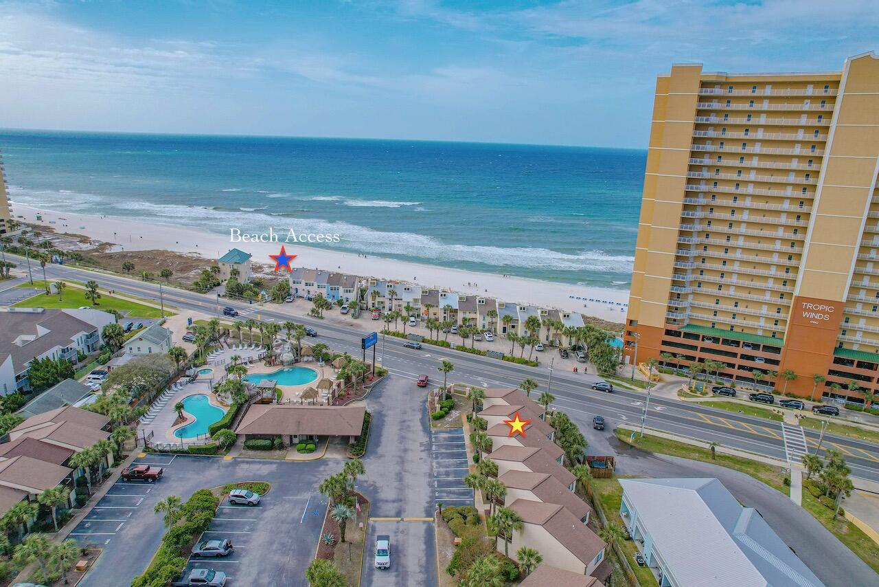 $335k!! Across the street from beach., Two views of Gulf from back porch and Upstairs Master bedroom. One Owner, never rented 2 bedrooms with 2 full baths and 1/2 bath.. Projection is $ $38k. This beautiful condo is located at the FRONT of Portside Resort. Simply walk out your front door, take 20 steps to pool with waterfall.. Beach access across the street in front of pool. Pllease call with any questions.