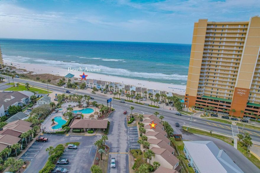 $335k!! Across the street from beach., Two views of Gulf from back porch and Upstairs Master bedroom.  One  Owner, never rented  2 bedrooms with 2 full baths and 1/2 bath.. Projection is $ $38k. This beautiful condo is located at the FRONT of Portside Resort. Simply walk out your front door, take 20 steps to pool with waterfall.. Beach access across the street in front of pool.  Pllease call with any questions.