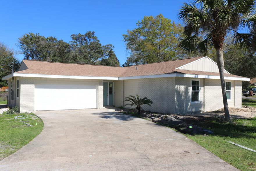 freshly remodeled 3 bedroom 2 bath house in the heart of Destin. Fresh Exterior Paint, crown molding in all rooms except bedrooms, new electrical wiring, expanded Laundry room, all new double insulated windows, new bathroom fixtures, vanities, toilets and tile master shower. the sellers are willing to include a $1500 flooring allowance to allow the buyer to choose carpet color of their choice and a $900 appliance/refrigerator allowance with acceptable offer. property appraiser records and actual square footage are not the same as the property appraiser site has not been updated with additions and changes to the air conditioned and heated spaces. yard work, irrigation and construction clean to be completed by 3/11.