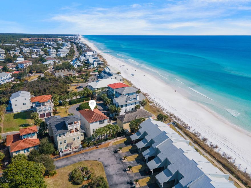 Welcome to Isla del Sol, a breathtaking 7-bedroom, 6-bathroom coastal escape nestled in the heart of Scenic 30A's Blue Mountain Beach community. This stunning three-story home accommodates up to 16 guests and offers unparalleled Emerald Coast views from expansive upper-floor balconies. With a premier location just one property back from the Gulf and a short distance to the community pool, Isla del Sol offers the perfect setting for a memorable coastal getaway.Step inside to discover seamless indoor-outdoor living. The first floor features a spacious bunk room with two twin-over-full beds and direct access to a beautiful outdoor patio. Fire up the propane grill for alfresco dining beneath swaying palm trees, and take advantage of the laundry room with a full-sized refrigerator for added convenience. 

The main level of Isla del Sol is designed for gathering, with a bright and airy great room adorned with coastal-inspired d??cor, white-washed wood accents, and sea-blue hues. The gourmet kitchen boasts sleek black granite countertops, stylish blue cabinetry, and matching black appliances, creating a perfect blend of elegance and charm. A large dining table seats 12 guests, while the kitchen island doubles as a breakfast bar for 4ideal for morning coffee or casual snacks. Relax in the spacious living area with plush seating and a TV, or step onto the private balcony to enjoy breathtaking sunrises and sunsets. This floor also includes a guest bedroom, perfect for added privacy.

Upstairs, the top floor offers ultimate comfort and serenity with three beautifully appointed bedrooms. The primary suite features a private balcony, while two guest bedrooms share an expansive balcony with cozy seatingthe perfect spot to unwind and soak in the coastal breeze.

With on-site parking for 4 vehicles and 7 adult bikes included, guests can easily explore the nearby Timpoochee Trail and Point Washington State Forest. Whether you're looking to relax by the Gulf, bike scenic coastal paths, or simply enjoy time with loved ones, Isla del Sol delivers the perfect mix of comfort and luxury.