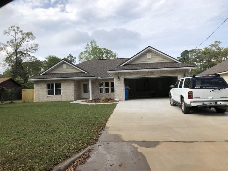 LOCATION LOCATION LOCATION!!! MINUTES FROM SPECIAL FORCES AND EGLIN BASES. BEAUTIFUL GATED COMMUNITY WITH SIDEWALKS THROUGHOUT.  CUSTOM 4 BEDROOM 2 BATH ALL BRICK HOME WITH 9and 10 ft CEILINGS ON A LEVEL LOT.  YOU WILL LOVE THE VERY OPEN FLOOR PLAN!! KITCHEN BOAST CUSTOM ALL WOOD CABINETS WITH SOFT CLOSE DRAWERS, STAINLESS APPLIANCES,  PANTRY,  STAINLESS FARM SINK,  GRANITE COUNTER TOPS ALONG WITH WOOD LOOKING VINYL PLANK THROUGHOUT THE HOME.  A FLOOR PLUG IS INSTALLED IN THE FAMILY ROOM AS ANOTHER UPGRADE WITH REVERSE TREY CEILING WITH LIGHTING.   MASTER BATH IS HEAVENLY WITH IT'S  RECESSED LIGHTING,  GRANITE COUNTER TOPS, CUSTOM TILE SHOWER WITH BENCH, RAINHEAD AND SEPARATE SPRAYER AND A 6FT TUB WHEN YOU NEED TO RELAX.  This home is perfect for entertaining.  The family room opens up