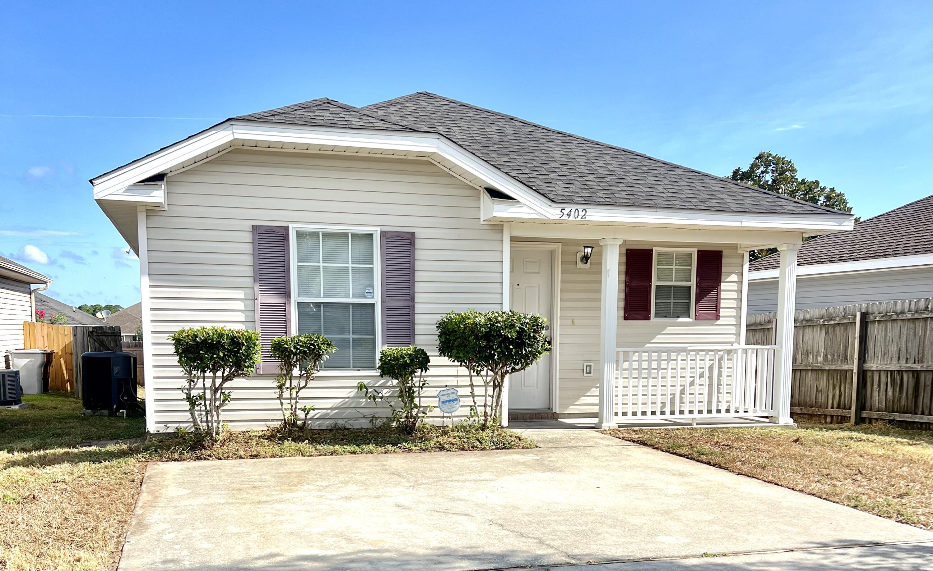 Introducing the perfect Florida cottage! Step into this charming 3-bedroom, 2-bathroom home and prepare to fall in love with all the potential it has! With 9-foot ceilings, a beautifully open kitchen, and a delightful first-floor owner's suite featuring a spacious walk-in closet, this home exudes comfort and functionality. This 1031 sq. ft. home, built in 2007 and features an open floor plan with a living area, dining, and large kitchen that seamlessly flow together. And as a bonus-seller offering a credit to replace the roof (due to the age) at closing!! Centrally located near bay, sound, river access, shopping, dining, and the zoo, this Florida cottage in Shadow Lakes is a true gem. Step outside to find a large patio perfect for outdoor enjoyment in the fully fenced backyard.
