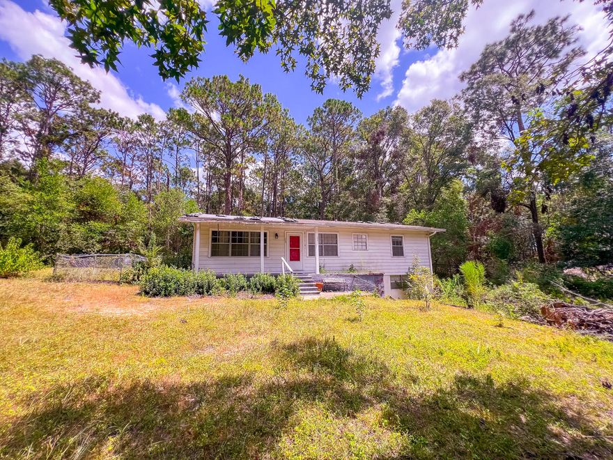 Bring your creativity and elbow grease to 155 Smith St to shine up this diamond in the rough! There's so much potential just waiting to be tapped into. This 3 bedroom 2 bath, split level home boasts a very spacious kitchen and den area with a back porch that runs almost the width of the home. It could be perfect for entertaining guests or enjoying the cooler nights of fall. All you need is a fire pit because there's plenty of lawn debris that needs picked up and burned. The downstairs bedroom has income-generating potential because of its separate bath, laundry hook-up up, and door leading the outside. It needs a new owner to love it and make it shine again! Call today to check out this property!