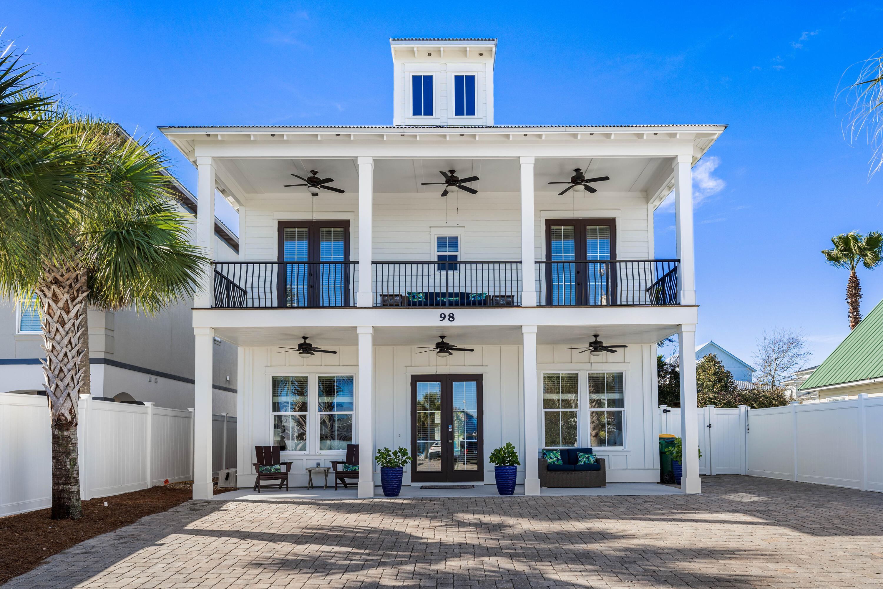 Destined to be a rental powerhouse in much-desired Crystal Beach, this home is just blocks from snow-white beaches. Lightly rented and much improved by the current owners, this beautiful, 2016 built, recently updated and furnished home is clean-as-a-whistle. With an open floor plan, this house has all the features you need for family time, hosting get-togethers or vacation rentals! The stunning finishes of this SqFt 6 bed/6 bath home included shiplap in a coastal cottage design.The resort-style backyard oasis features a pristine heated pool, hot tub, and hot/cold shower. The custom yard comes complete with a grill master's kitchen, cabana, Plenty of Parking and places to Store Owner Gear.