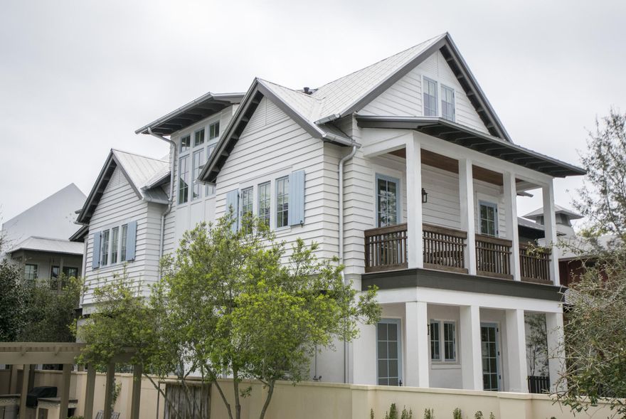 A exquisitely designed and furnished home on a beautiful shaded and quiet boardwalk in Rosemary Beach. This property is located in the heart of Rosemary, close to town, beach, all amenities and green spaces. The first level of the home has a spacious living and gathering area. Shared with dining for 10 and a kitchen decked out with Poggenphol custom cabinets throughout. The kitchen has extensive storage and one full Subzero freezer and one full Subzero refrigerator. A quartz stone island provides the family ample space for food preparation. The home boasts Travertine Floors on the 1st level and Cherry Hardwood floors on the staircase and upper floors. You will be impressed with the use of clean modern line furnishings mixed with lovely traditional and antique pieces.
