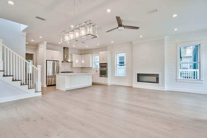 Newly completed construction by Bay Custom Builders, this beautifully designed beach house has a grand facade with porches on two levels. The entrance will invite you into a full-width living room with ample space for defined formal dining and living areas beneath an airy 10-foot ceiling. The open kitchen draws the eye with its tasteful cabinets and comprehensive range of fitted appliances. Tailor-made for gourmets and those who love to entertain, it boasts a 9-foot island which is sure to be a natural hub for hanging out or lingering over breakfast and pre-dinner cocktails. The hallway leads to a guest bathroom, laundry and master suite. The turning staircase leads up to an open entertaining area which would make an ideal second sitting room or play area. The well-planned second floor space includes a second master suite, two guest bedrooms and a practical bunk room fitted with six bunks - a fun space for youngsters to call their own. Discover your own favorite café for breakfast in the neighborhood or enjoy the dining, boutique shopping and entertainment just a few blocks from Rosemary and Alys Beach. The stunning white beach is just a short distance away for morning walks or fishing, and golfers are minutes away from Camp Creek Golf Club. In the opposite direction, Camp Helen State Park provides a natural environment rich in outdoor activities including birding, hiking, kayaking and fishing on Lake Powell.