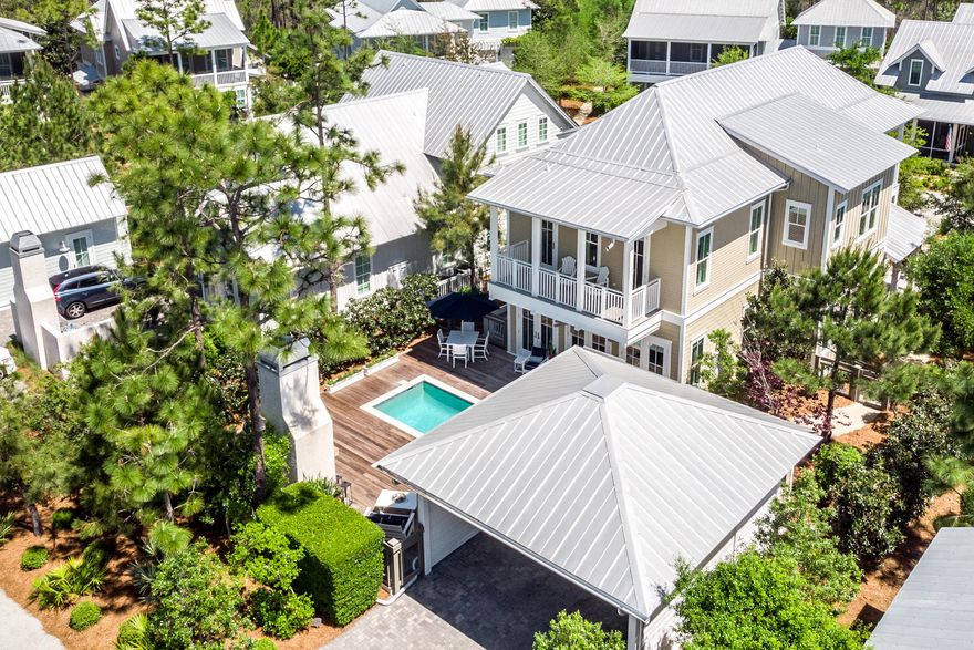From the moment you step onto the grounds of this stunning Watercolor home, you will be amazed by the overall sense of privacy & attention to detail. The home has been meticulously maintained & is offered fully furnished. Built by Romair Construction, this home has had only one owner & has never been rented. No detail was overlooked in the design, it's finishes or it's beautiful furnishings. The breathtaking open concept great room offers abundant windows & natural light, a stunning state of the art kitchen & lovely dining area all overlooking the pool, fireplace and spectacular outdoor living oasis that is secluded by the addition of mature landscaping. Open the triple set of French doors in the great room & step outside to the saltwater pool
