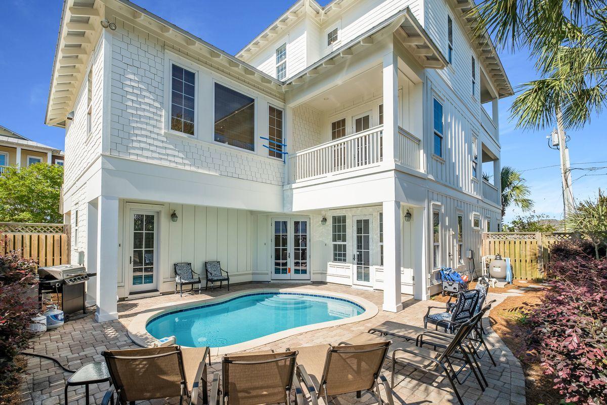 Exemplary coastal charm juxtaposed beautiful panoramic gulf views with prominent positioning in the heart of Miramar Beach characterize this masterful residence which offers over +3,800 sq ft of living space spanning an impressive four-story vertical footprint which allows for sweeping gulf vistas. This property conveys with a 70'x 60' additional vacant land footprint allowing exceptional room for growth including a potential gulf view carriage house, larger pool, etc. Exceptional investment opportunity abounds with $200,000+ in projected annual rental revenue and over $150,000 booked YTD 2021 in base rental rate.