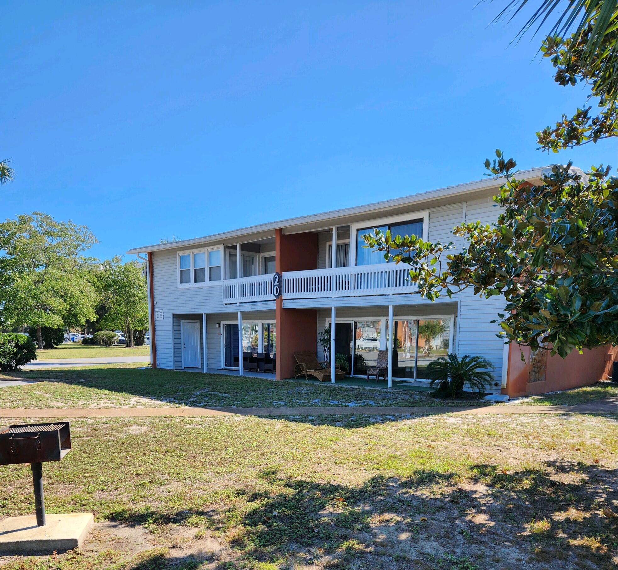 WHAT A STEAL! BEST PRICE IN GULF TERRACE! More amenities than the million dollar conds offer! Private Lake w/fishing & water fountains. 3 new pools-1 is Heated. 2 PICKLEBALL/TENNIS COURTS! New gazebos, private restrooms near pools, outside showers, BBQ Grills, Picnic areas. Clubhouse under renovation. Newly renovated laundry mat. Game room coming. Meticulous landscaping! Walk to beach-across the street. Boat & RV storage for a fee when available. BEST Location in heart of Destin. #1008 offers a private front yard for relaxing in your living room or covered private patio. W/D. NEW LVP flooring, ceramic tile & new carpet. New Gel-Foam mattresses. Perfect for full time living. No Rental Restrictions! Just bring a toothbrush. Fully furnished.