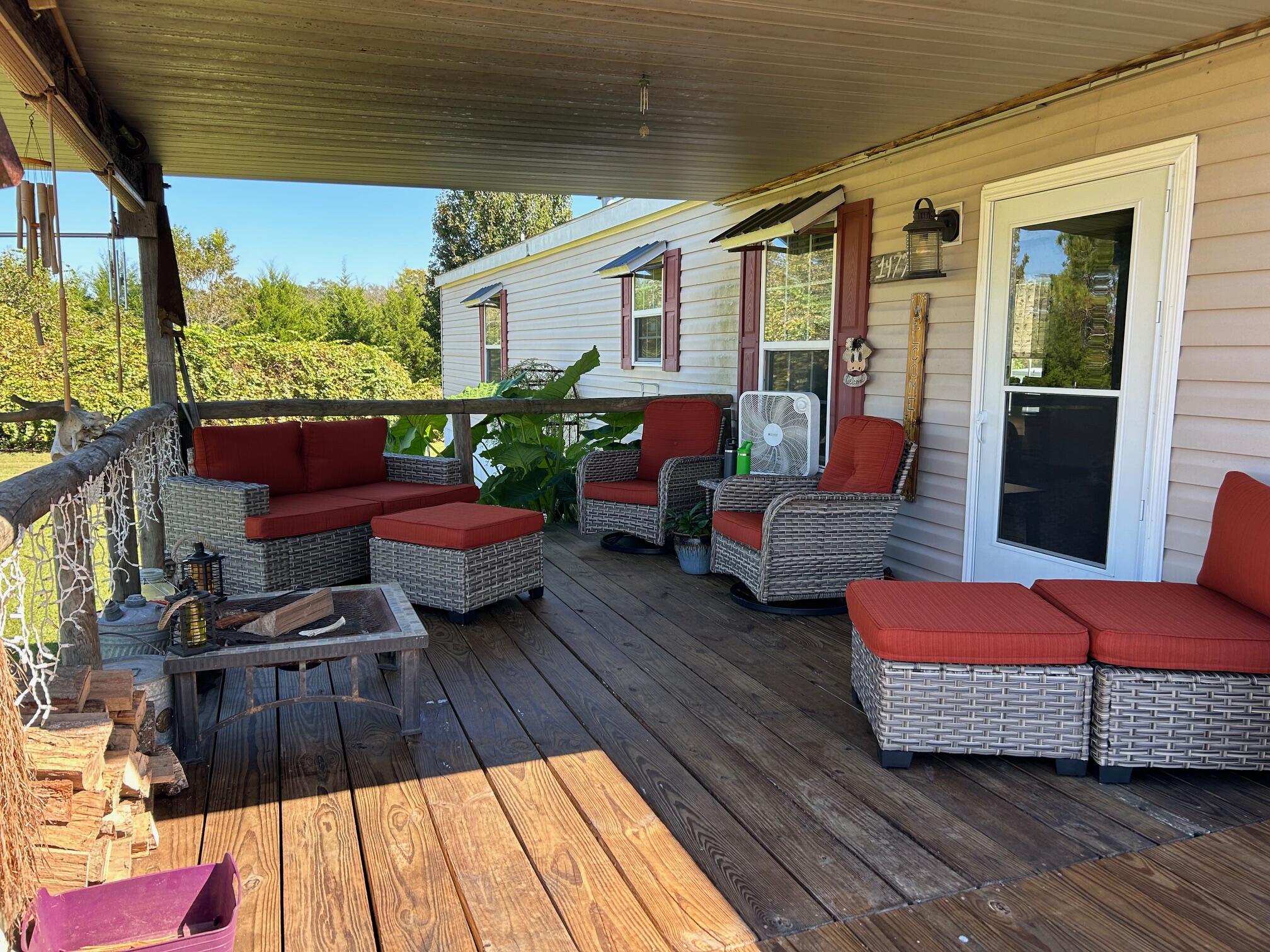 Nestled in a tranquil setting, this 13-acre property offers well-manicured pastures, a main home, a cottage, a 36x36 open-air barn, two sheds, one being 12x24 with a loft and the other that is 12x16 and a 10x20 chicken coup! All of this makes for an ideal home for anyone seeking a well-kept living space accompanied by functional outdoor facilities.**Main House Features: **The spacious main residence exudes fresh appeal with all interiors newly painted. It consists of three bedrooms, two bathrooms and an open concept living, kitchen and dining area. The house is equipped with all appliances. The dishwasher and a washer are just a year old, ensuring modern comforts. The addition of a new water filter system last year continues to guarantee clean and safe drinking water.  There is a covered extra-large deck for entertaining or leisure, and a newly built deck to a 15-foot above-ground pool for warm-weather enjoyment.

The property is meticulously maintained with full fencing, cross fencing, and gated entries that assure both security and privacy. It supports agricultural activities, thanks to a shared well system with a neighboring 2-acre parcel. Well-designed with dual-horsepower capabilities extending 180 feet deep, supplying ample water for household and farming needs.

**Cottage Details: **
Adjacent to the main house is a charming 1-bedroom, 1-bathroom cottage that embodies rustic charm and additional privacy. It includes a full-length screened-in porch, which provides a perfect spot for relaxing evenings, protected from the elements, and it over looks one of the pastures. 

**Outdoor Amenities: **
The property's outdoor features are exceptionally functional, with multiple water spickets located around the premises - front of the main house, backyard, near the gate at the pasture past the cottage, and alongside the front pasture. Each of these placements ensure that water access is convenient, irrespective of where one is on the property. For convenience, the property includes two automatic livestock water supplies, which are essential for rural living.  There is a useful shed with a loft area, perfect for storage or creative space, a backyard shed with electricity, ideal for projects or extra storage, and an outdoor water spicket for convenient gardening or other outdoor activities. There are also four free range chickens that go to roost at night and produce eggs and deer that frequent the property on a daily basis. 

This property is a perfect blend of comfort and functionality, designed to cater to both residential and agricultural needs. It's an excellent choice for those looking to enjoy country living with all the necessary modern conveniences. All that's missing are your horses!