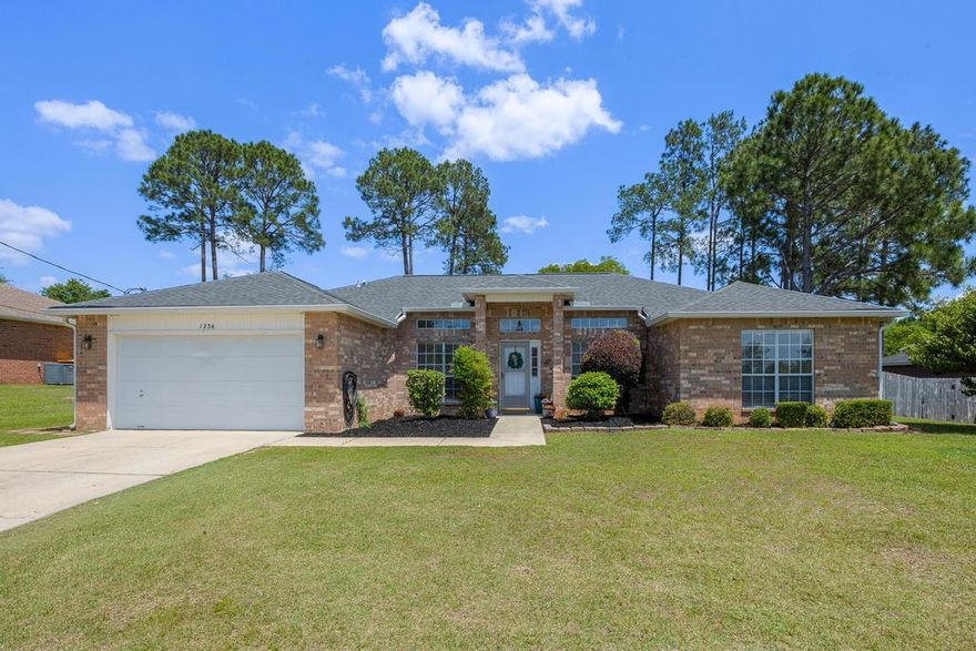 Available Now! - This 4 bedroom/2 bath/ 2 car garage home is located South of I-10 in the Northview Estates neighborhood.  The homw welcomes guests with raised ceilings in the family room accented with a fireplace.  The home is freshly painted in a neutral paint cheme with LVP flooring throughout the home.  The kitchen features stainless steel appliance package with updated cabinetry, solid surface countertops, and a kitchen island.  The master suite boasts treyed ceilings, dual vanities, large walk in closet, garden tub and separate tiled in shower.  The home features a formal dining room and separate office/flex space.  The additional bedrooms are nice sized with ample closet space.  The screened in porch off the living room is perfect for entertaining or enjoying your morning coffee