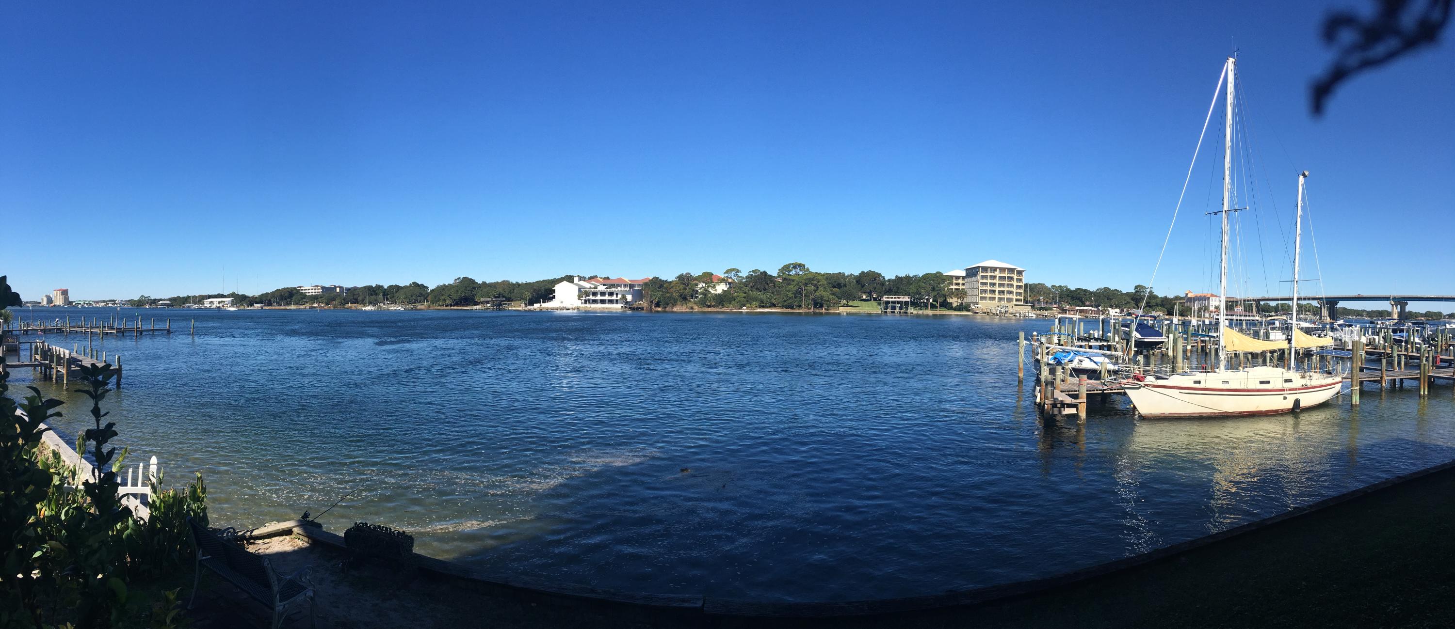 OPEN HOUSE SUN 1-3!! Soundfront Awesome Condo with ENDLESS VIEWS!! 1 BR 1Ba, very large 1st floor corner unit with a 50' Wrap around Covered Porch!! You can actually fish right out your door. 2 large sliding glass doors overlooking sound. Bedroom has walk in closet plus another small one. Boat slips available for monthly fee. 1 assigned parking right at your front door. Excellent location by Brooks Bridge, see fireworks, Billy Bowlegs & many other events right on your back porch. Community Pool, Playground & Picnic area.Beach is 2 block walk away. Best of both worlds for any water activities.Emerald Coast Convention Center a short distance, many Restaurants just a walk away. This is a MUST see. All measurements to be verified by Buyer not guaranteed.