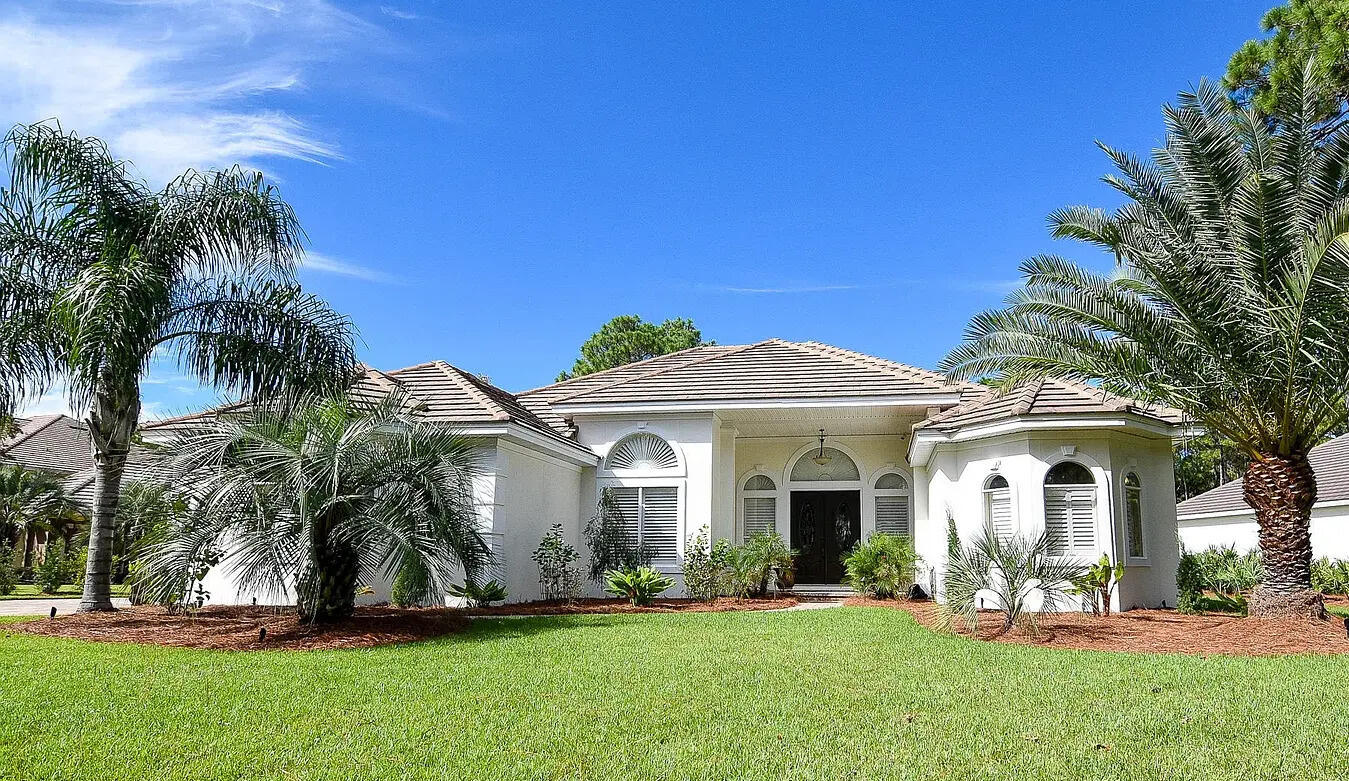 NEW NEW NEW PRICE !!!FLORIDA LIVING AT ITS FINEST IN THE PRESTIGIOUS GATED GOLF COMMUNITY OF REGATTA BAY. This One Level 3 Bedroom 3 Bath Plus Office Mediterranean Home with Pool sits on an Estate Sized Lot with lots of Privacy. Home has Tall Ceilings with an Open Split Floor Plan with Main Bedroom with Split Vanities and 2 Walk In Closets on One side and the 2 Guest Rooms on the other side of the house. Floors are Hand Scraped Hickory, Porcelain Tile and Stone. Kitchen has Lots of Cabinets, Stainless Appliances and a Gas Stove. Outdoor Summer Kitchen by the Pool and Spa. Generator, Fenced Yard and Two Car Garage.Owner Ready to Sell.
