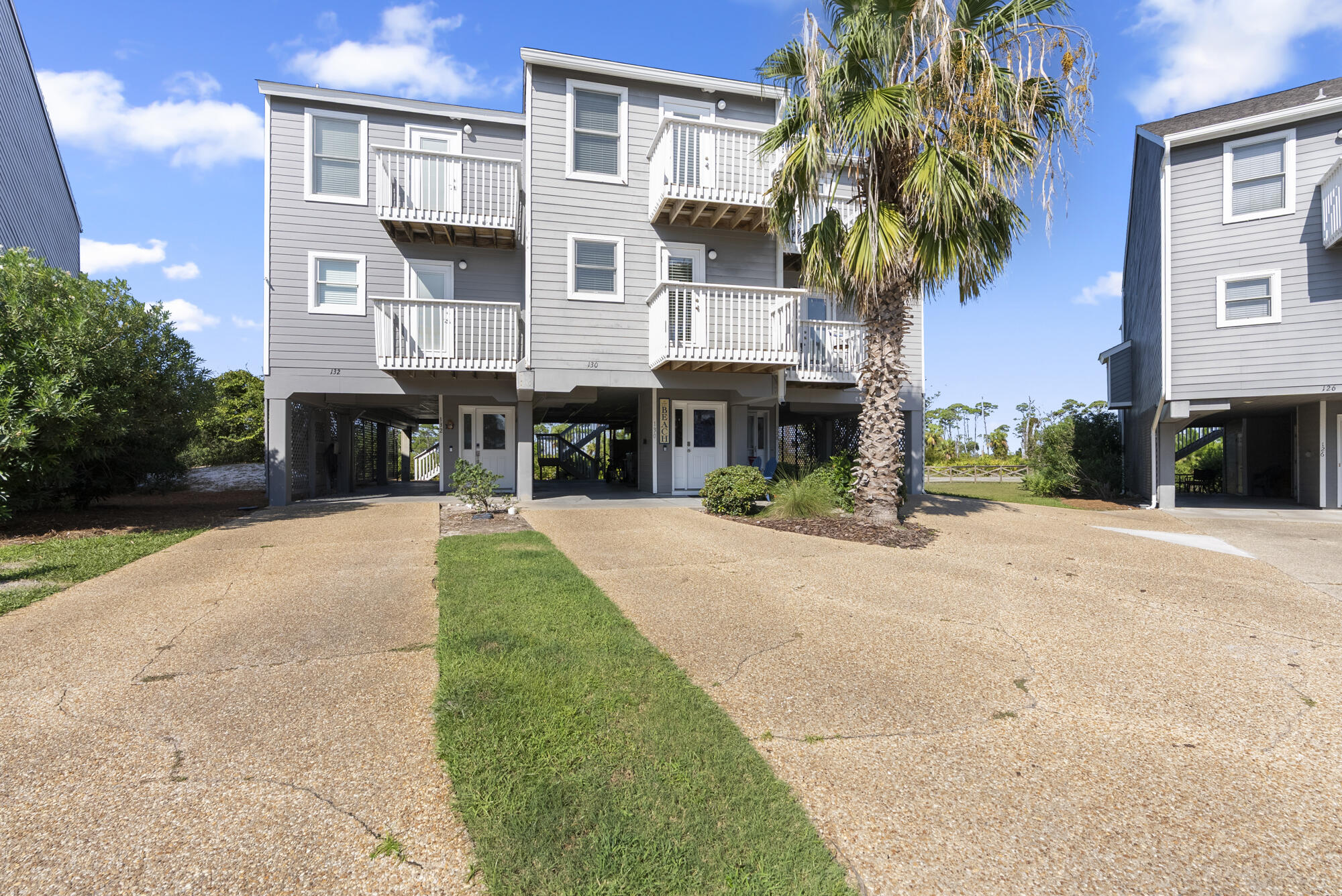 Take your pick! Enjoy views of St Joe Bay from a beautiful and well appointed back porch or from the top floor master bedroom. Spacious and furnished 3 bedroom 3 bath townhome located in the gated and beach front community of Barrier Dunes. Enjoy dedicated beach access at one of the North Cape's most beautiful and wide beaches that is within walking distance to the the state park. other amenities include 3 stocked fishing ponds, tennis and pickle ball courts, beachfront clubhouse, 4 beach accesses, 2 swimming pools, playground, and street lights. 1ST Level is well equipped and has an open floor plan with spacious kitchen, updated appliances inclusive of a wine refrigerator, and breakfast bar for the kids or entertaining. A bedroom with balcony that is just perfect for private morning coffee as well as a full bath. 2ND LEVEL has a master suite with en suite bath and bay view balcony. laundry closet with full size washer and dryer is located in the hall that leads to the second bedroom with en suite bath and private balcony overlooking a small park. The parking underneath is covered concrete and very spacious with lockable storage as well as an outside shower. Please take the time to view our 3-D matterport video for more details.