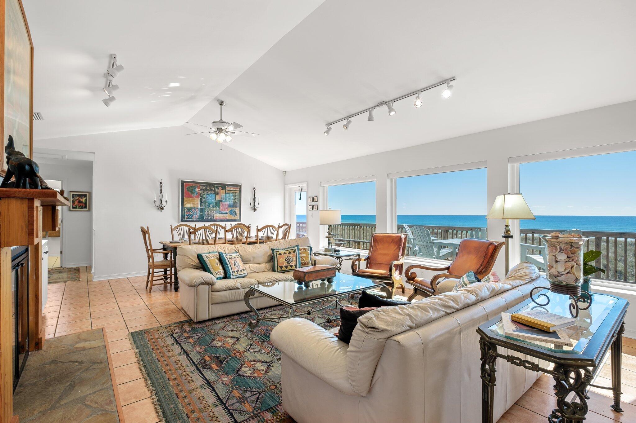 Enjoy beautiful Gulf Views from inside your home and only a few steps to the water's edge in this fabulous Beach Home on Navarre Beach. There are 5 bedrooms, 3 baths, plus a second-floor bonus room. Well maintained and updated. Open living with fireplace, built ins, large kitchen with counter seating for 5+. Three bedrooms and two baths on one side and 2 bedrooms and 1 bath on the other side of the house. Beachside deck runs the complete length of the home adding loads of outdoor living space to enjoy. Second floor has a large bonus room with built in shelving and bunks and access to a second outside deck. Home is sold furnished and turn key with a great rental history and reservations. Makes a perfect second home/beach investment property. Seller requests all reservations be honored.