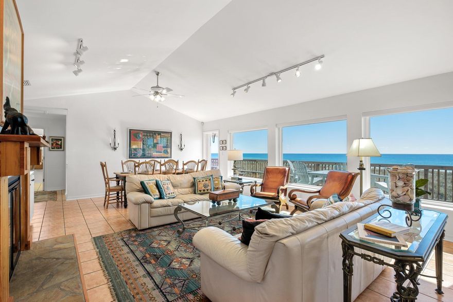 Enjoy beautiful Gulf Views from inside your home and only a few steps to the water's edge in this fabulous Beach Home on Navarre Beach.  There are 5 bedrooms, 3 baths, plus a second-floor bonus room. Well maintained and updated. Open living with fireplace, built ins, large kitchen with counter seating for 5+. Three bedrooms and two baths on one side and 2 bedrooms and 1 bath on the other side of the house. Beachside deck runs the complete length of the home adding loads of outdoor living  space to enjoy. Second floor has a large bonus room with built in shelving and bunks and access to a second outside deck. Home is sold furnished and turn key with a great rental history and reservations.  Makes a perfect second home/beach investment property. Seller requests all reservations be honored.