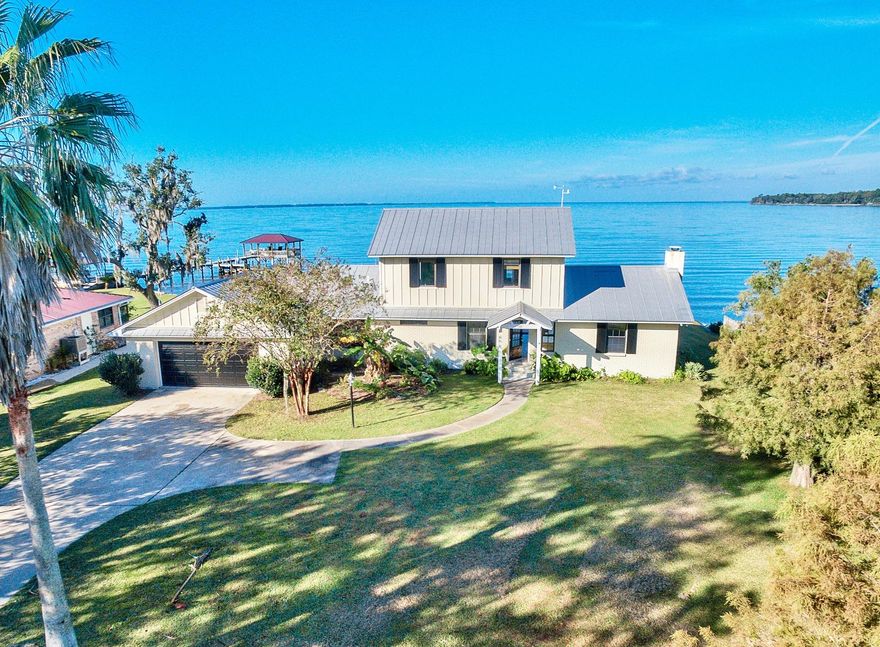 List Price: $314,900. Beautiful Two Story 3 bedroom, 2 bathroom, 2 car garage waterfront home on a spacious lot. Covered porch, open layout, high ceilings, lots of natural lighting, breakfast area and bar, dining room, large master bedroom, deck upstairs, covered patio downstairs, and gorgeous bay views. BUYER TO VERIFY SCHOOLS, MSMTS, TAXES, HOA, ETC. NO REPRESENTATION TO VALIDITY OF INFO IS MADE. BUYER TO VERIFY ALL INFORMATION WHEREIN. HOME SOLD AS IS WHERE IS. Bank of America, N.A. associates, household members and business partners are prohibited from purchasing REO properties, either owned or serviced by the Bank, whether directly or indirectly. Property is at auction, please see private remarks for further details.