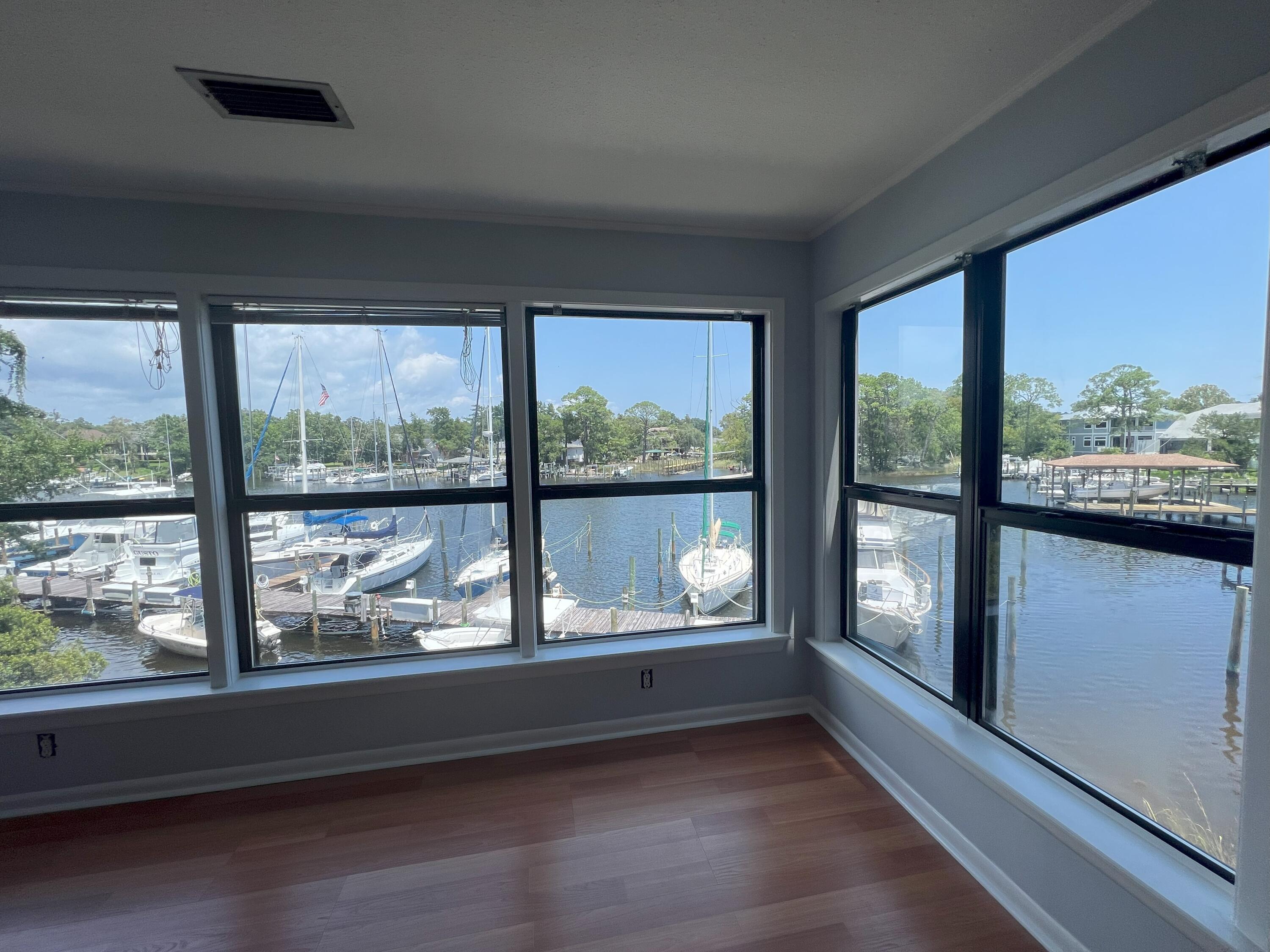 One bedroom waterfront condo with a magnificent view! 2nd floor with new carpet in the bedroom, fresh paint, and washer/dryer included in the unit. Community is located next door to the Bluewater Bay marina and LJ Schooners. Convenient to Eglin AFB and the Midbay Bridge. No smoking, pets will be considered. One year lease, security deposit, and application fee required.