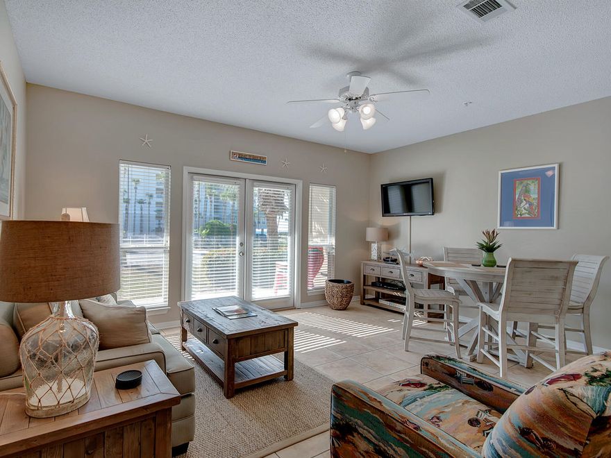 Great ocean views from this ground floor unit across the street from the beach! 9 ft ceilings, tile floors, built-in hall bunks and washer/dryer in the unit...Deeded beach access just steps from this condo! Caribbean Dunes is a popular getaway located in the heart of Crystal Beach - near wonderful restaurants and shopping including entertainment hub Destin Commons with upsacle shopping, dining, and more.