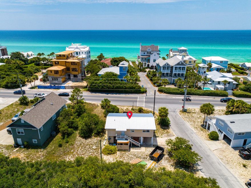 An incredible opportunity to build your dream house on an oversized corner homesite in the heart of Seagrove Beach! The possibilities are endless!  Create the 30A retreat of your dreams with .2 acres of prime real estate fronting Scenic Highway 30A and only steps to the public beach access. A natural buffer of trees on the north boundary provides privacy in this established area of Seagrove. Popular with families, the lively Seagrove Beach community features local restaurants, boutique shopping, activities, and a convenient location between Seaside and WaterSound Beach. Park your car and walk, bike, or golf cart to anywhere you want to go! Don't miss this rare offering!