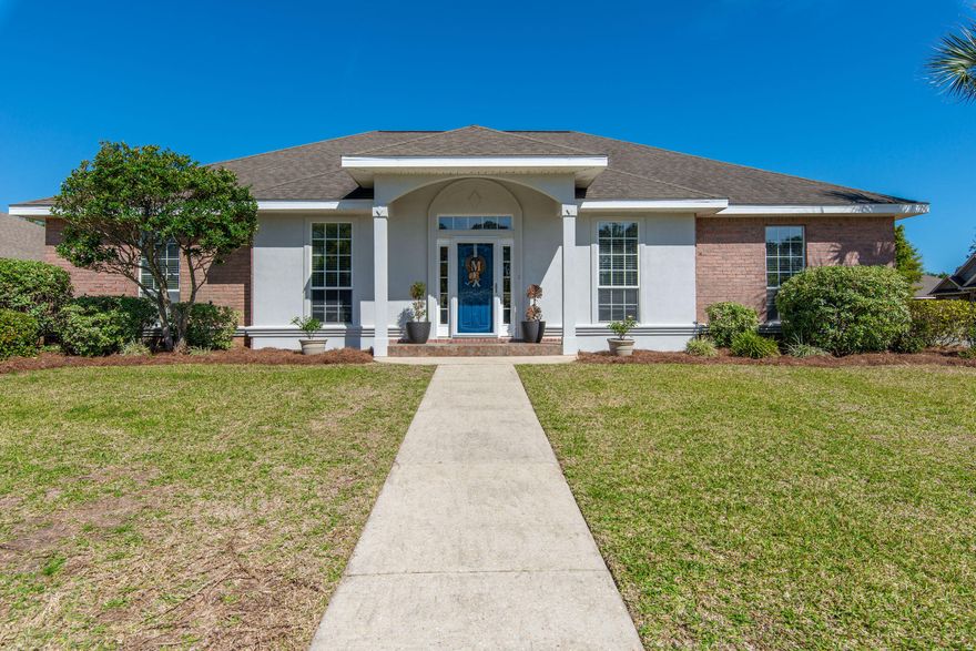 Perfect gulf coast custom pool home with screen enclosure. The freshly painted interior brings your to a coastal retreat with 4 bedrooms and 2.5 bathrooms. Open floor plan with plenty of space, includes a formal dining room, formal living room, family room, breakfast room, and a kitchen complete with a breakfast bar. The large wrap-around back patio offers great place to unwind at the end of the day, before you retreat to the master oasis. The master includes a huge walk-in closet in the bathroom, tub and shower, and perfect lighting. This amazing home is situated on a corner lot with a side entry garage with an extra wide driveway for guest parking. Woodlawn Heights is a highly desired community with underground utilities, sidewalks, picnic area, playground and area for boat/RV parking.