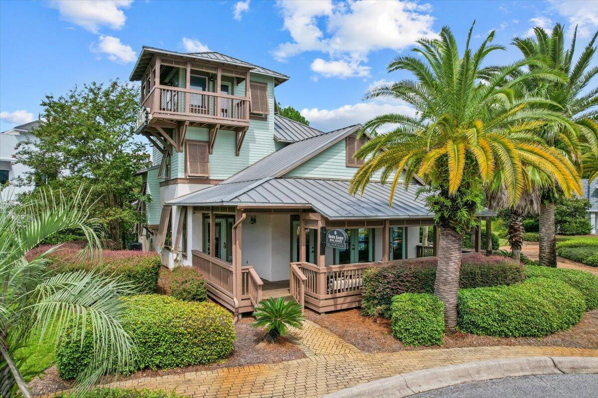 Luxurious office with convenient access to Emerald Coast Parkway.  Employees will love coming to work each day with four private offices/rooms, a large lobby/waiting/reception area with beautiful vaulted tongue and groove wood ceilings & a fireplace. French glass doors open to the covered porch and also add lots of natural lighting.  The kitchen and copier room are located behind the reception area. The conference room and one large office are located on the main level.  The upscale office includes hardwood pine floors throughout. The office is surrounded with pristine outdoor landscaping and beautiful fountains maintained by the HOA.  Plenty of parking in front of the building and in the side parking lot.  Currently used for a real estate office.