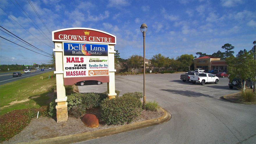 Rare opportunity to lease space at sought after Crowne Centre- a beautifully maintained, multi-tenant, shopping plaza.Located on Navarre Parkway just east of Gulf Breeze, Florida. Crown Centre is an eye-catching strip mall comprising of eight rental spaces. Great tenant mix to include the popular Bella Luna Italian Bistro, Studio 98 Hair Design, Luxury Nails, Paradise for Pets, Architectural & Design. Space is configured with 3 offices on the left side. 2 offices on the right side of the unit (3/4 walls), storage rooms, RR, reception, and lobby. There is vinyl plank flooring in the hallways and the offices are carpeted. The previous user was a massage therapist.Perfect location for retail or office.