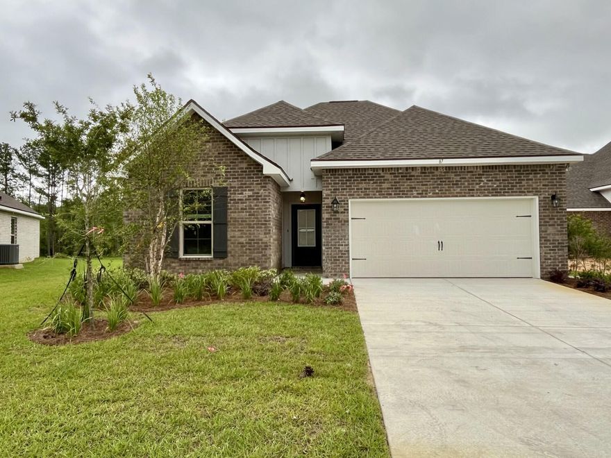 The CEDAR IV G in Wildflower at Hammock Bay community offers a 4 bedroom, 3 full bathroom, open design. Upgrades added (list attached).  Features: double vanity, garden tub, separate custom tiled shower with frameless door, and walk-in closet in the master suite, double vanity in 2nd bath, en suite bath in bedroom 2, kitchen island, walk-in pantry, covered rear patio, boot bench in mudroom, crown molding, recessed lighting, framed mirrors in all baths, smart connect Wi-Fi thermostat, smoke and carbon monoxide detectors, landscaping package, architectural 30-year shingles, flood lights, and more!Energy Efficient Features: water heater, kitchen appliance package with electric range, vinyl low E windows, and more!