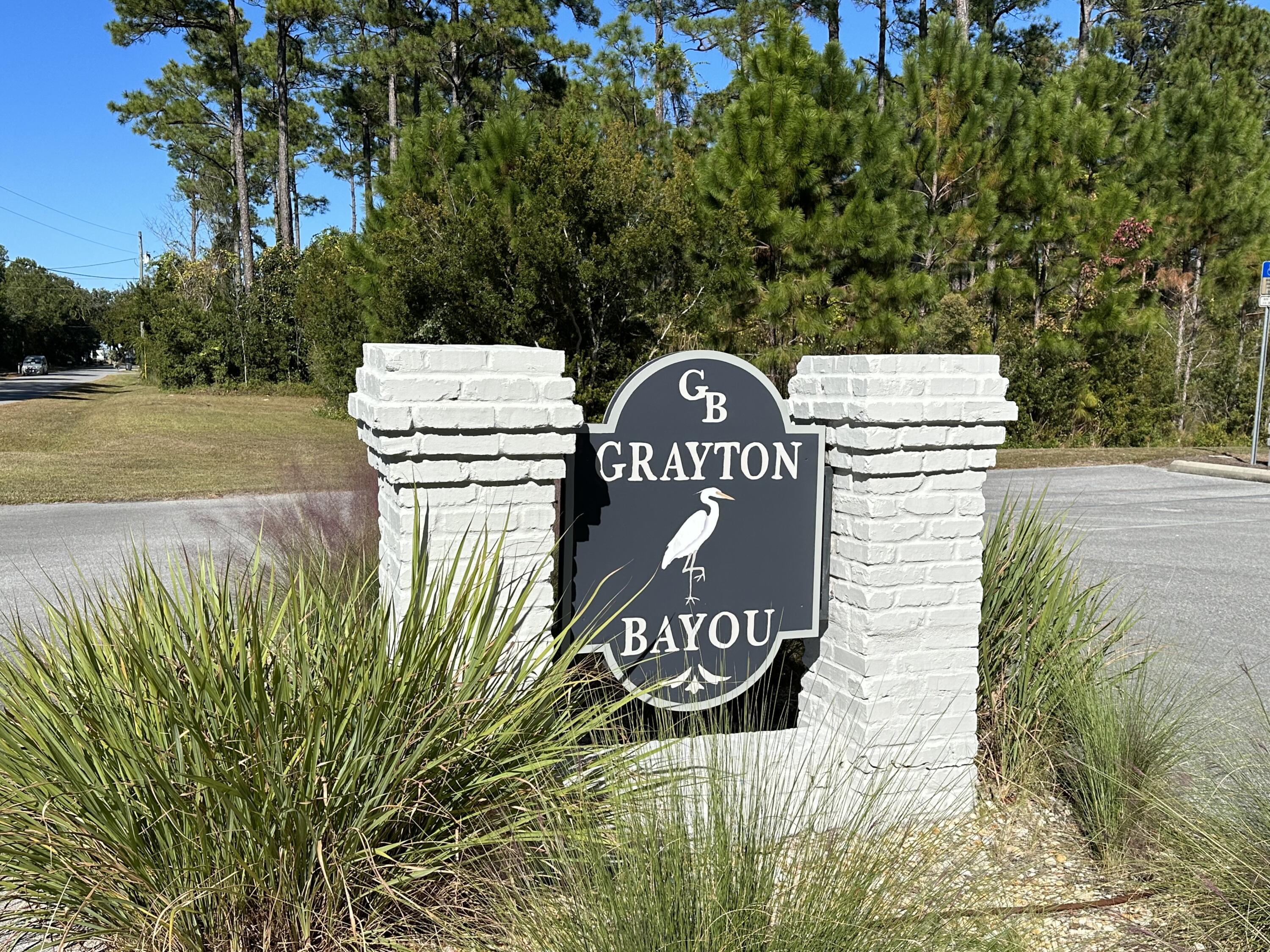 Entered for Comp. purposes. Grayton Bayou is located only 5 minutes north of Grayton Beach by the Pt. Washington State Forest. These streets are lined with Palm Trees & Oak's. This homesite has the Private Drive / Alleyway access on back. This homesite is one of the ''full size'' homesites and has room for a main house and a carriage house. Neighborhood has large swimming pool with waterfall, boat launch at end of Riker Ave., bay front park on E. Mitchell. Property is beautiful and wooded, new homes being built all around. Sold 'AS IS''