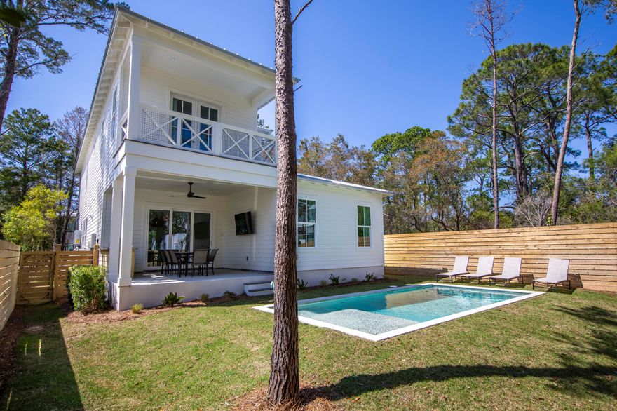 Discover your new sanctuary at 276 Clareon Drive, a fully furnished coastal haven just moments away from the enchanting beaches of 30A. Step into a luminous, open floor plan that effortlessly combines comfort and functionality exuding a welcoming ambiance. At the heart of this residence lies a gourmet kitchen, offering top-tier appliances, beautiful countertops, and abundant storage. With three generously proportioned bedrooms, each featuring its own en suite bathroom, and an expansive bunk area for additional guests or flex space. Venture outside to your private oasisan expansive lot offering year round play. The heated private pool and yard is sure to be a hit!
