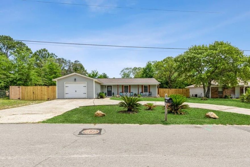 Beautifully renovated 3 bed, 2 bath craftsman in Mary Esther! This 1,200 sq ft home features new LVP flooring, smart thermostat, 2024 HVAC w/ UV Light, new water heater, and 2024 roof. Kitchen boasts stainless steel appliances, subway backsplash, and new blinds. Both baths updated with modern vanities; master has en suite with tiled shower and ceiling-mounted shower head. Spacious fenced backyard with covered patio and large shed (conveys)as-is. Covered front porch with updated pillars and shutters. Shed has a powered garage door and 30amp hook-up . Fenced in seperated dog area this home is  Move In Ready!