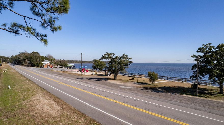 Incredible opportunity built on a beautiful Bay view Lot!! Choctawhatchee bay Views at a modest price. Located just north of and on Highway 20 across from the boat Launch where you will be able to have your boat in the water in just a few of minutes. Click on the photos to discover the type of views you will enjoy daily. So ...don't delay and don't let this opportunity slip away!