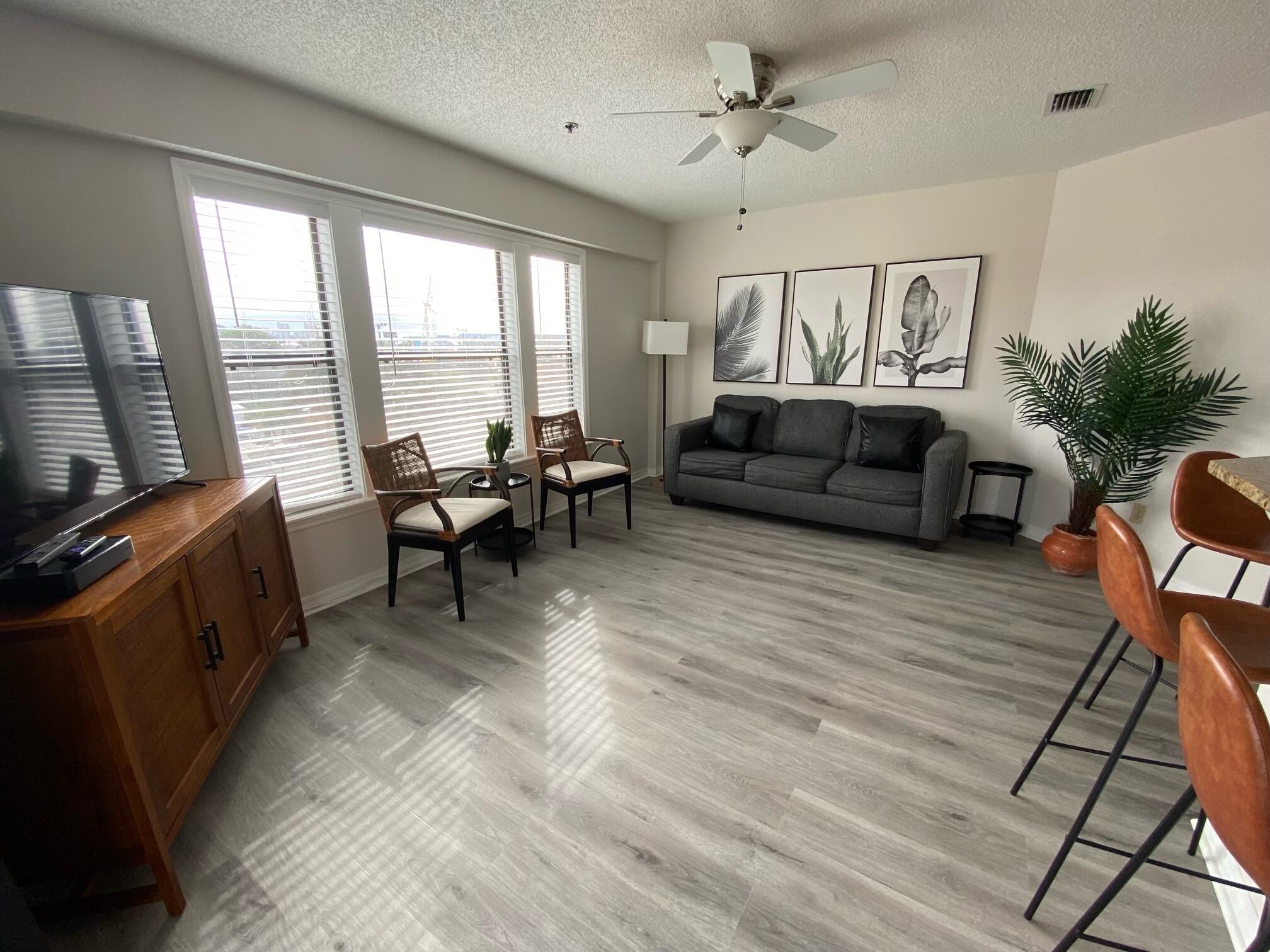 Spotless, spacious and a view of the Grand Lagoon. This 1 bedroom 1 bath condo is move in ready. Freshly updated. Many upgrades including granite countertops. This unit is being sold fully furnished and ready for its new owners or the rental market. St Thomas Square offers boat dock with day parking, pool, sauna, boat storage, tennis courts, shops & restaurants on site and walking distance to the beach. Dock your boat in the water during your stay and get to the beach by boat! Park your car, and never use it while you're on vacation here.