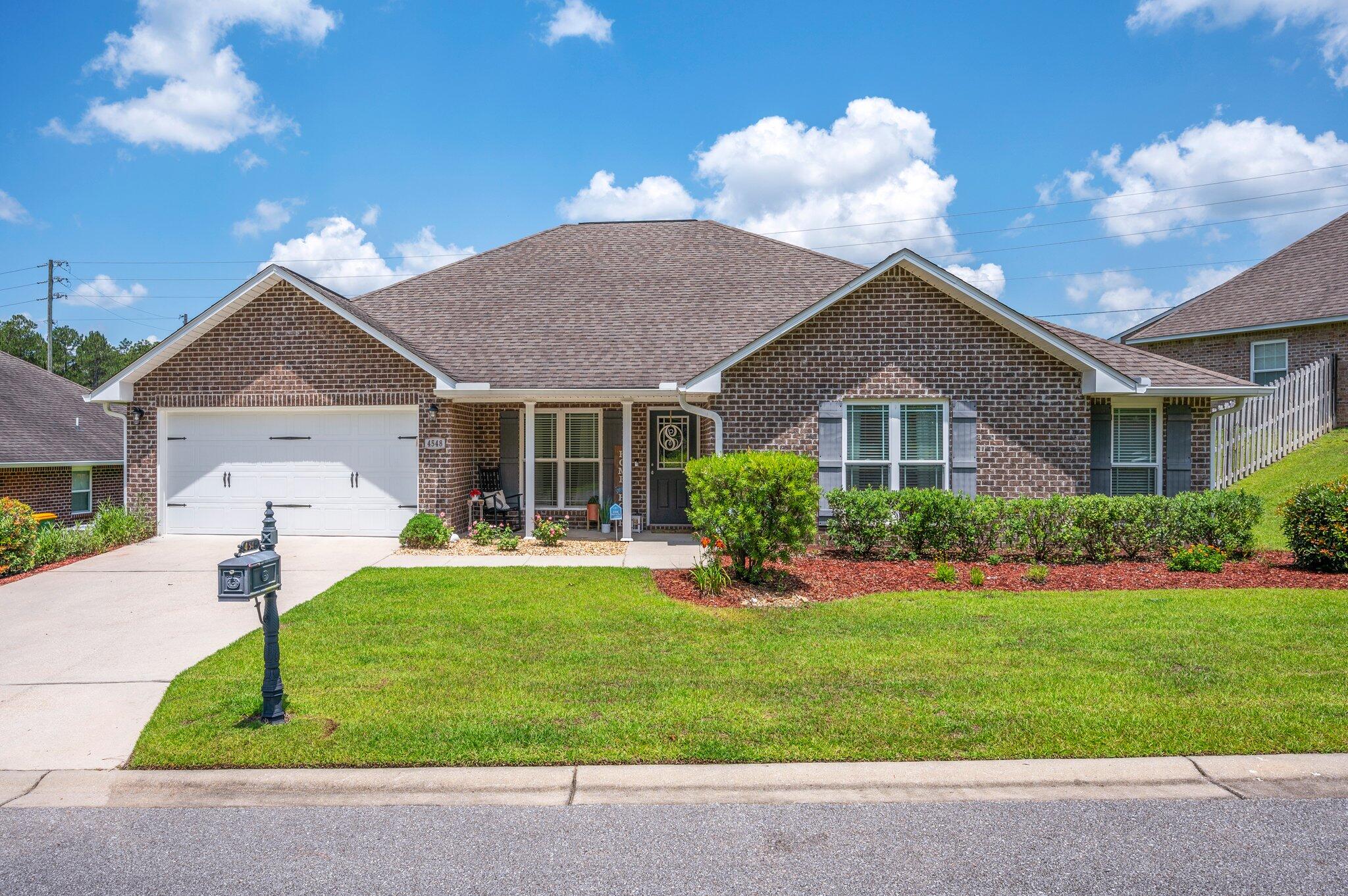 Your new home in South Crestview is minutes from everywhere you want to be yet still feels peaceful, private and tucked away. All brick, with 5 bedrooms, 3 full baths, a formal dining room, and a BONUS space - it provides the perfect balance of open concept living spaces and opportunities for privacy. The main level boasts all solid surface flooring (luxury vinyl plank or tile), adding to the overall beauty and making clean up a breeze. The eat-in kitchen has granite counters, custom cabinets & butcher-block island, breakfast bar w/pendant lights & stainless steel appliances! You will enjoy the split floor plan with an owner's suite so spacious it includes a sitting area, walk-in closet, and ensuite bathroom featuring two sinks, garden tub, and walk-in shower. The upstairs bonus room is currently an adorable playroom and is ready to be whatever you dream up. Four additional large bedrooms share 2 full baths on the other side of the home, each with a large closet. Backyard is fully fenced. Security system w/doorbell camera.